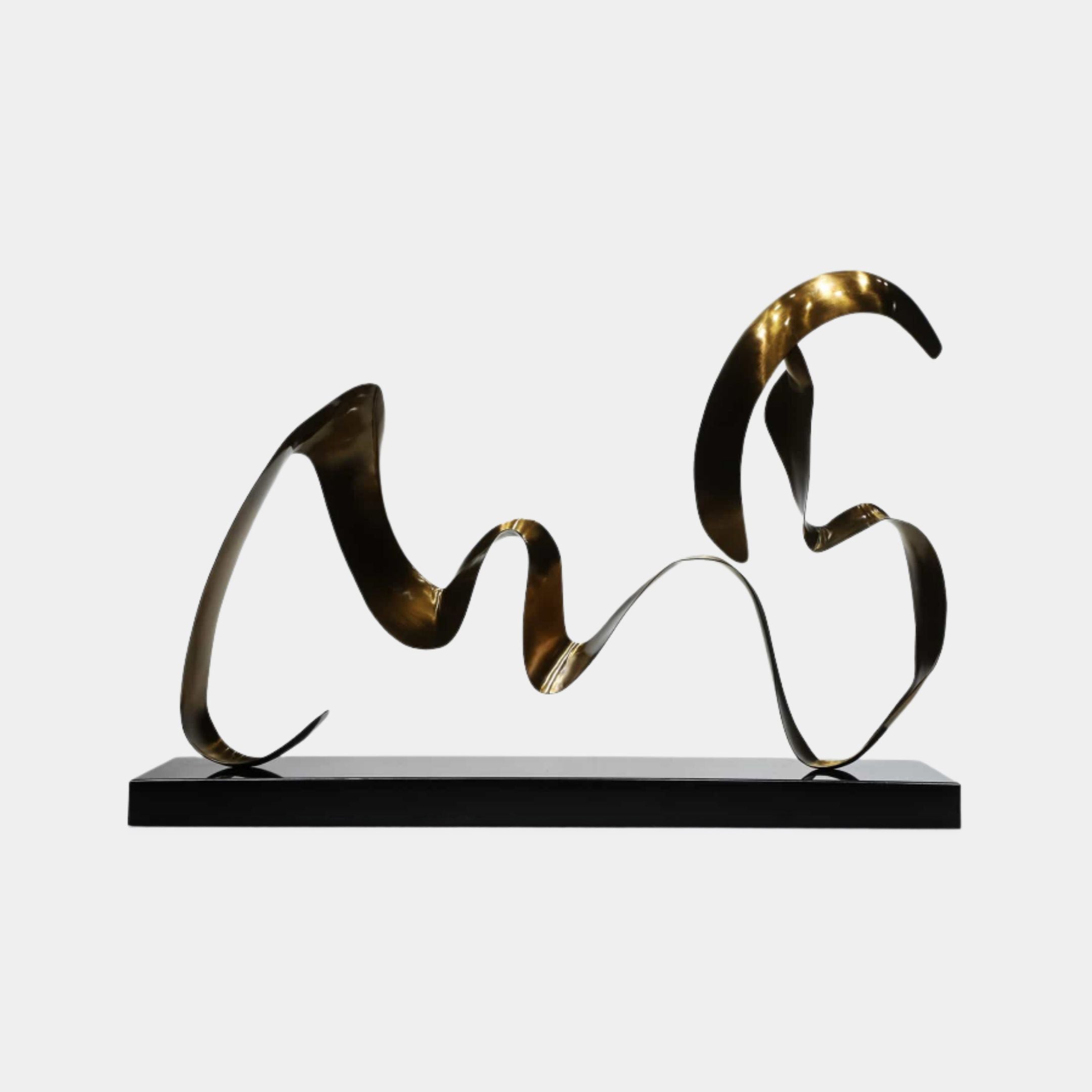 Antique Bronze Fluid Ribbon Abstract Metal Sculpture by Giant Sculptures, with twisting calligraphic ribbon forms on a black rectangular base against a plain background.
