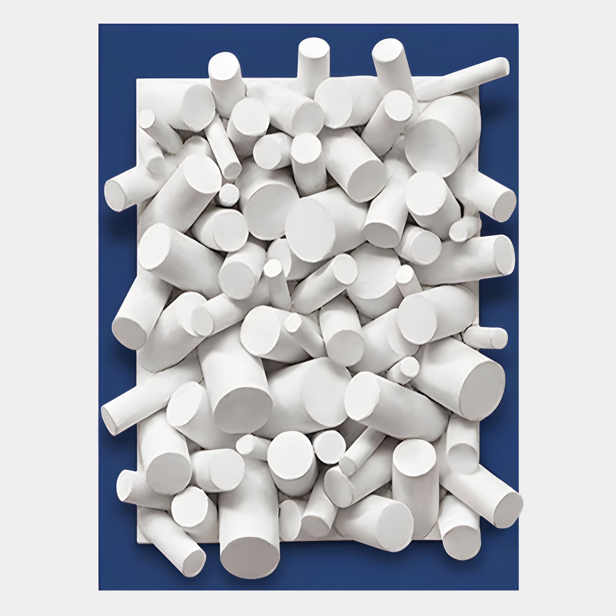 The Axion White Wood Cluster & Sapphire Blue Edge 3D Wall Art by Giant Sculptures features layered white wood cylinders of varying sizes set against a sapphire blue edge and rectangular background.