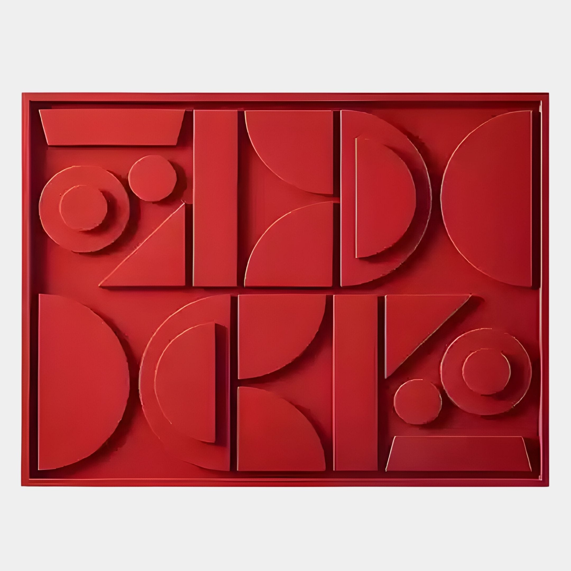 The Formate Vibrant Red Geometric Wood Painted 3D Wall Art by Giant Sculptures features raised circles, semicircles, rectangles, and triangles in a modern, symmetrical pattern on a bold red background.