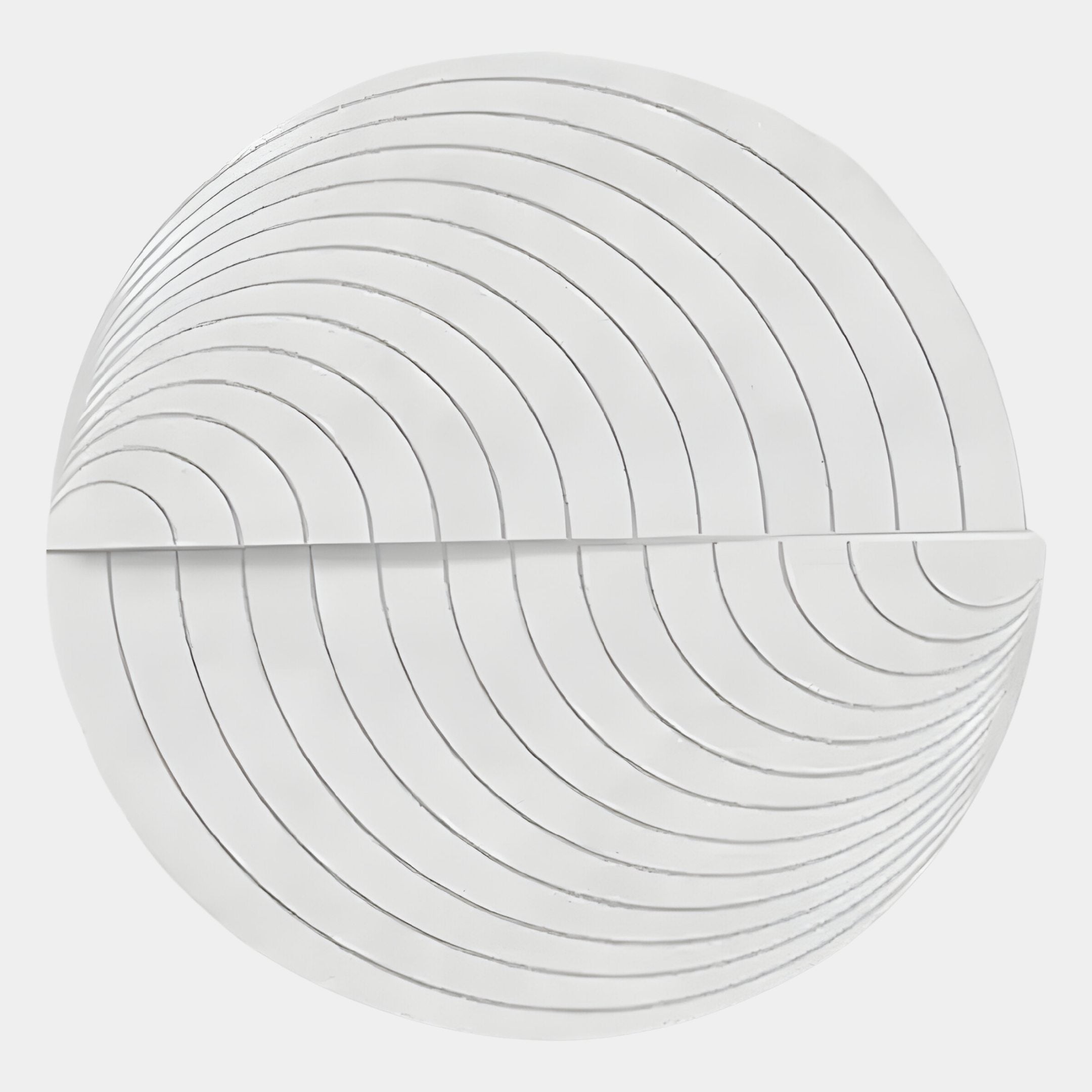 The Orbitals White Circular Wood Carved Sandstone 3D Wall Art by Giant Sculptures features a horizontal divide with curved, silver-accented lines radiating from the center, forming striking geometric wave patterns on both sandstone-finished halves.