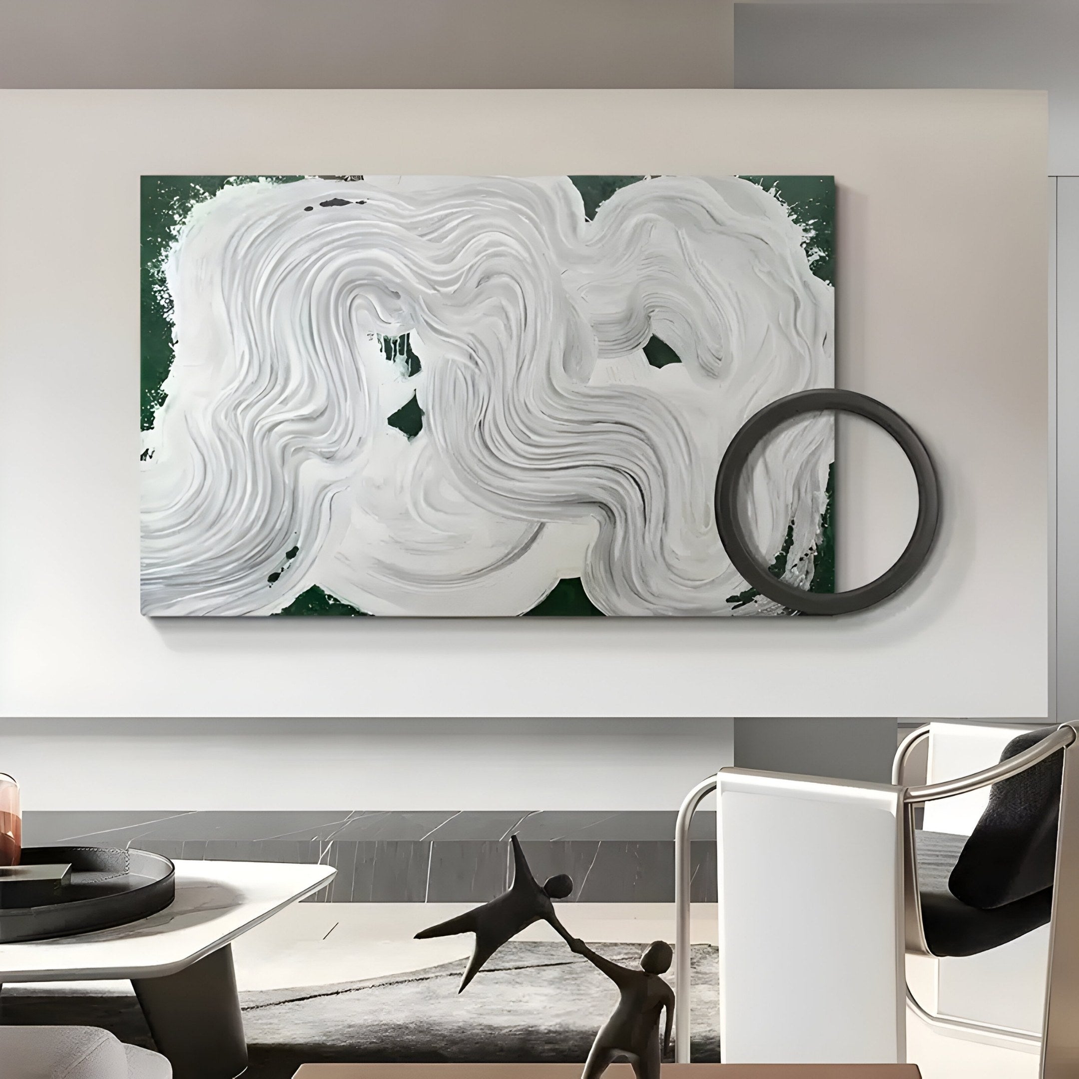 Calmant Green & White Abstract Hand-Painted Wall Art by Giant Sculptures showcases swirling white brushstrokes on dark green with a circular black ring, perfect for enhancing a modern minimalist room with sleek furniture and sculptures.