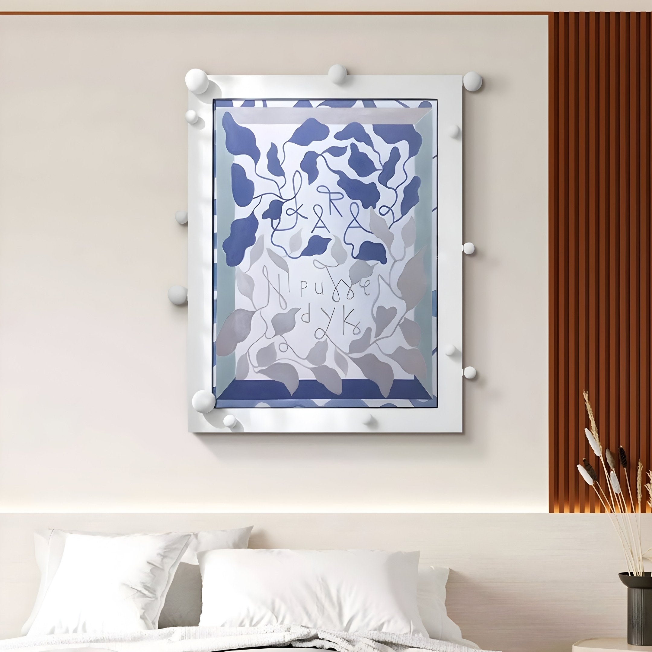 The Florere Misty Blue Hand-Painted Sandstone 3D Wall Art by Giant Sculptures features blue and gray organic shapes with abstract symbols, showcasing Nordic modern charm. Spherical accents elevate its appeal on a wooden slat wall above a bed with white pillows, a cozy blanket, and nearby dried plants.