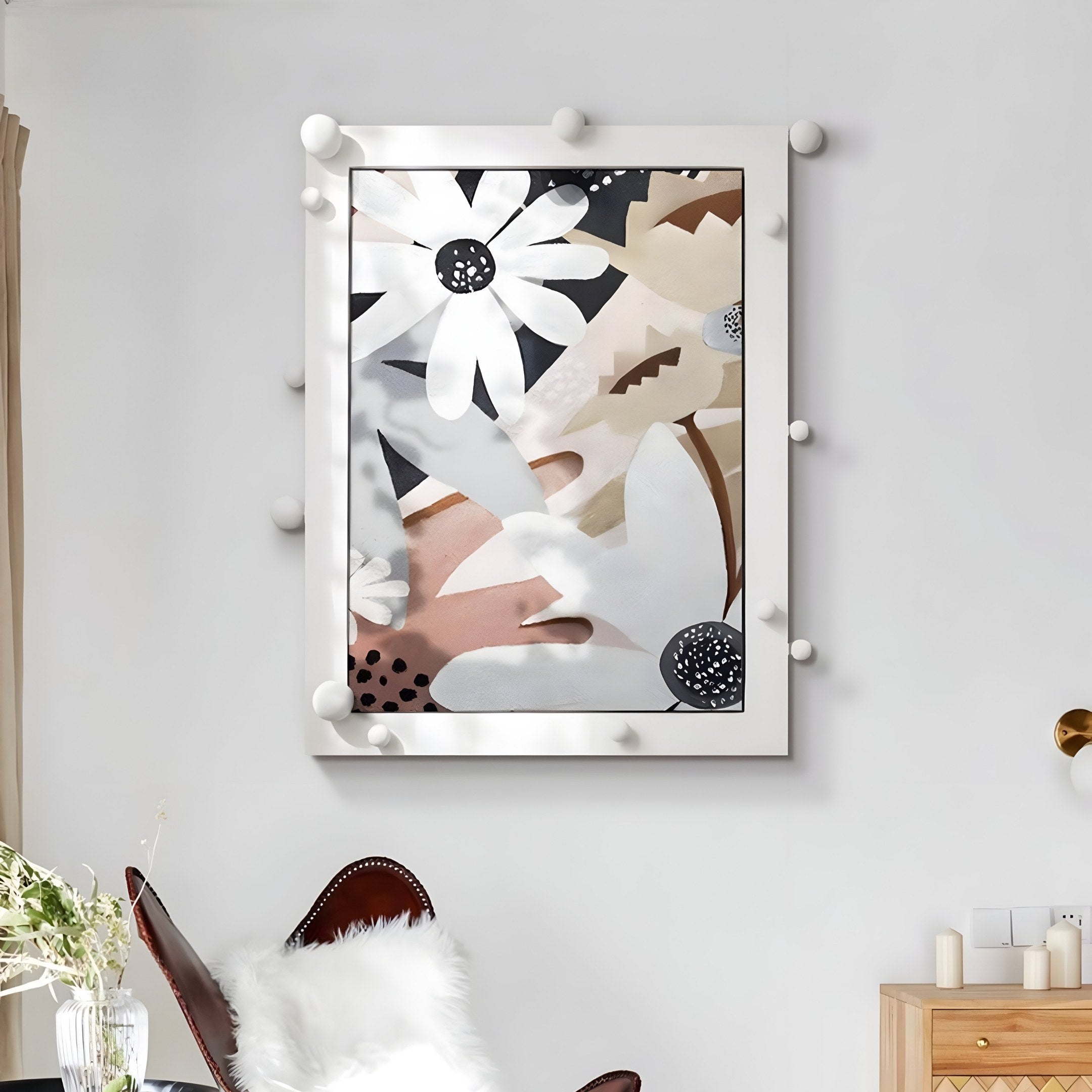 The Florere Neutral Bloom Hand-Painted Sandstone 3D Wall Art by Giant Sculptures features abstract floral designs in white, beige, and brown tones with large daisy-like flowers and geometric shapes. It is elegantly displayed above a leather chair next to a wooden side table decorated with a plant.