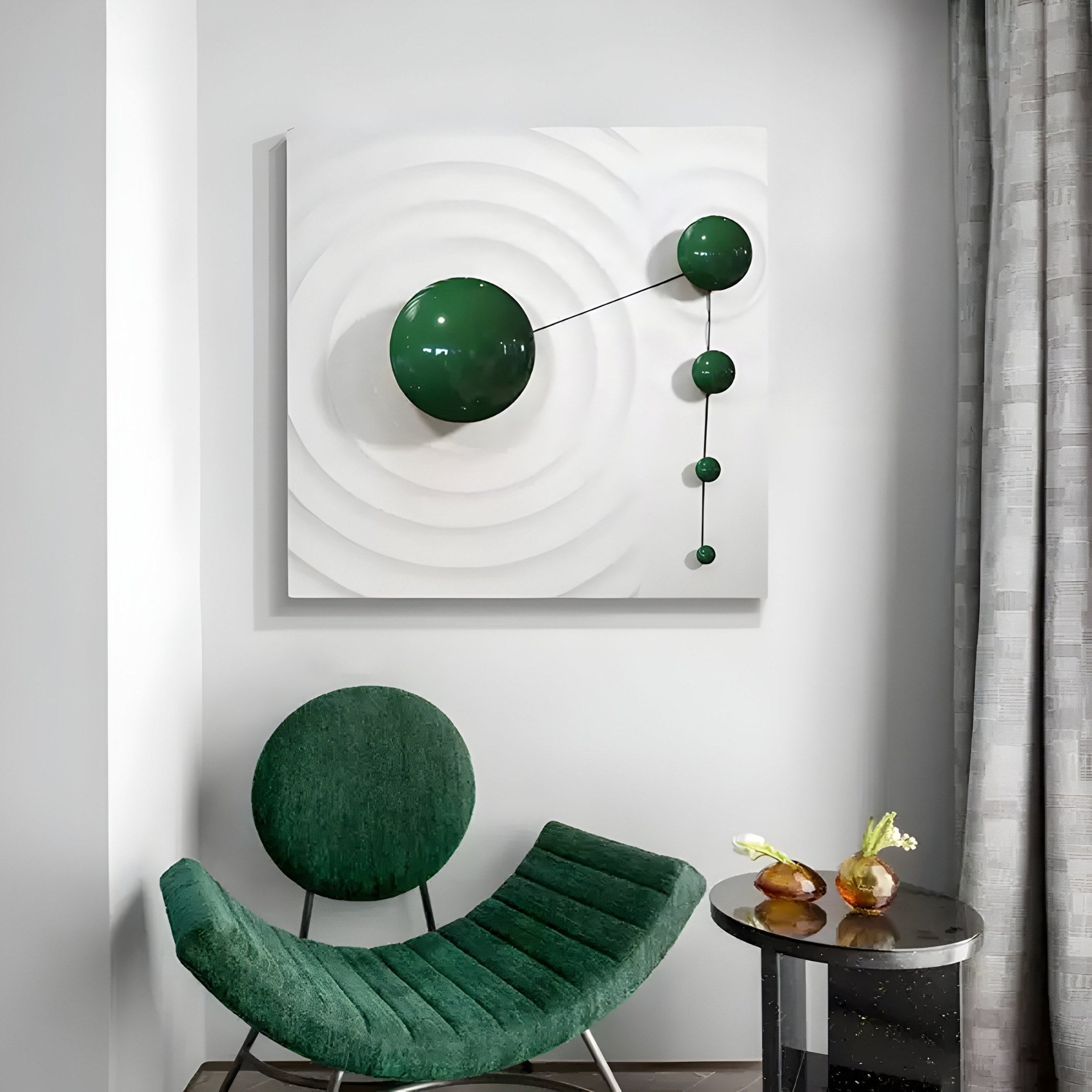 A modern room showcases Giant Sculptures Galactica White Wood Relief 3D Wall Art with green metal balls. A matching green chair and a small black table with a bulb vase and flowers sit beside gray curtains, enhancing the ambiance.