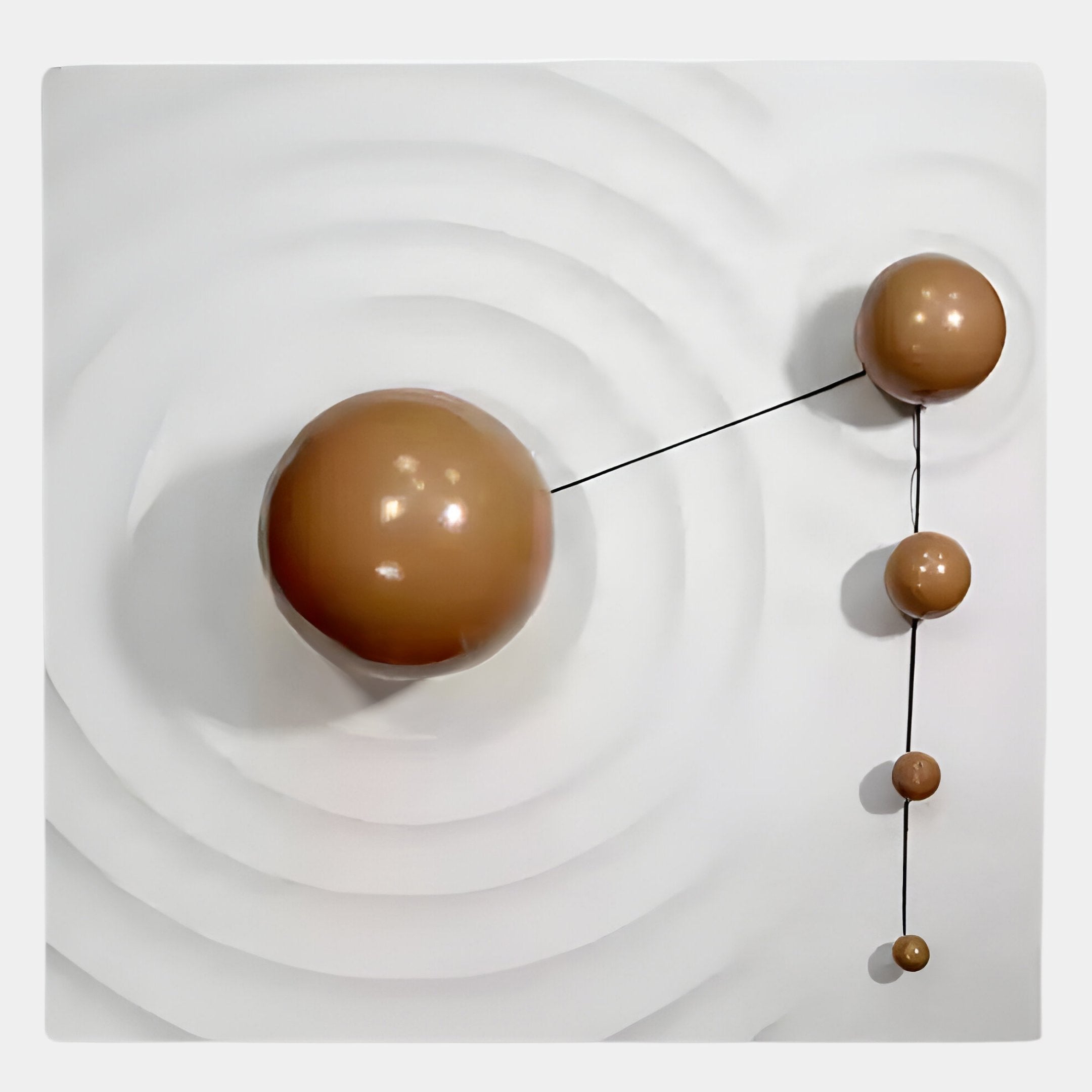 The Galactica White Wood Relief 3D Wall Art With Brown Metal Ball by Giant Sculptures features four brown metal spheres on thin black rods over a white concentric-patterned background for a minimalist, modern look.