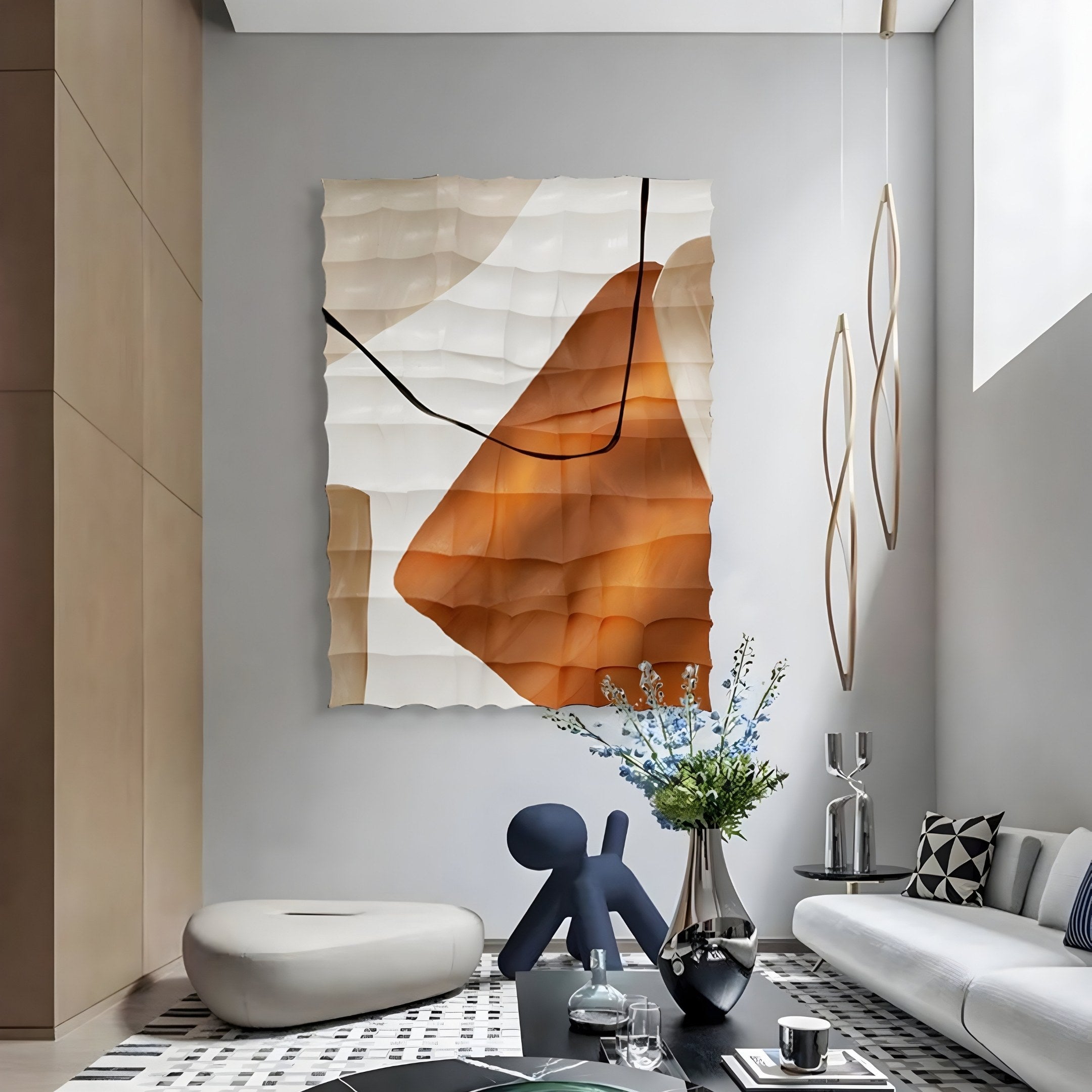 The modern living room features Terracurve III Hand-Painted Sandstone Wood Relief 3D Wall Art by Giant Sculptures. A white ottoman, black abstract sculpture, sleek vase with blue flowers, silver tea set on a checkered table, and elegant hanging lights complete the look.