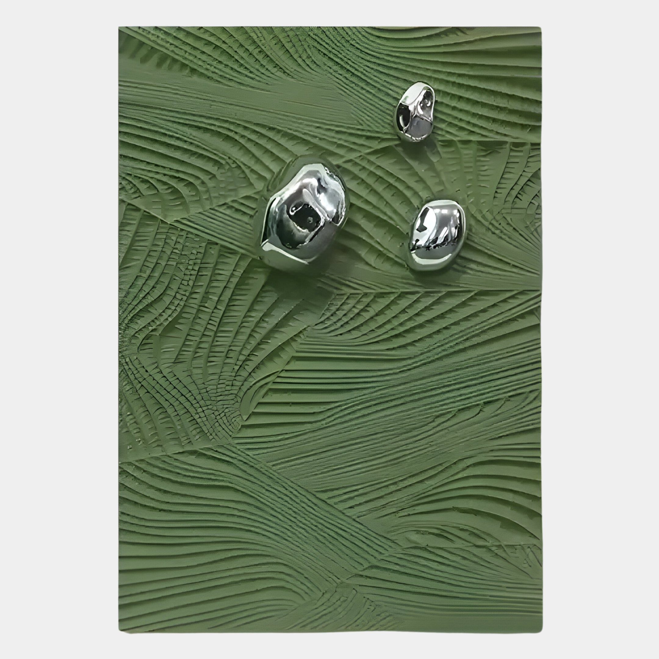 The Verdara Green Wood Relief 3D Wall Art by Giant Sculptures features a textured rectangular design with three floating, shiny metallic accents above a green patterned surface for a striking 3D effect.