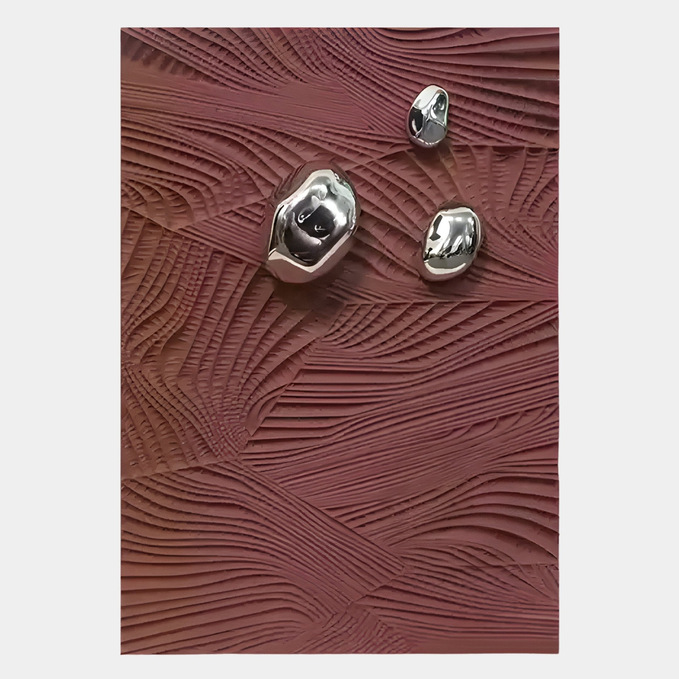 The Verdara Burgundy Red Wood Relief 3D Wall Art by Giant Sculptures features a textured, undulating surface with metallic accents, evoking modern design and striking visual depth.