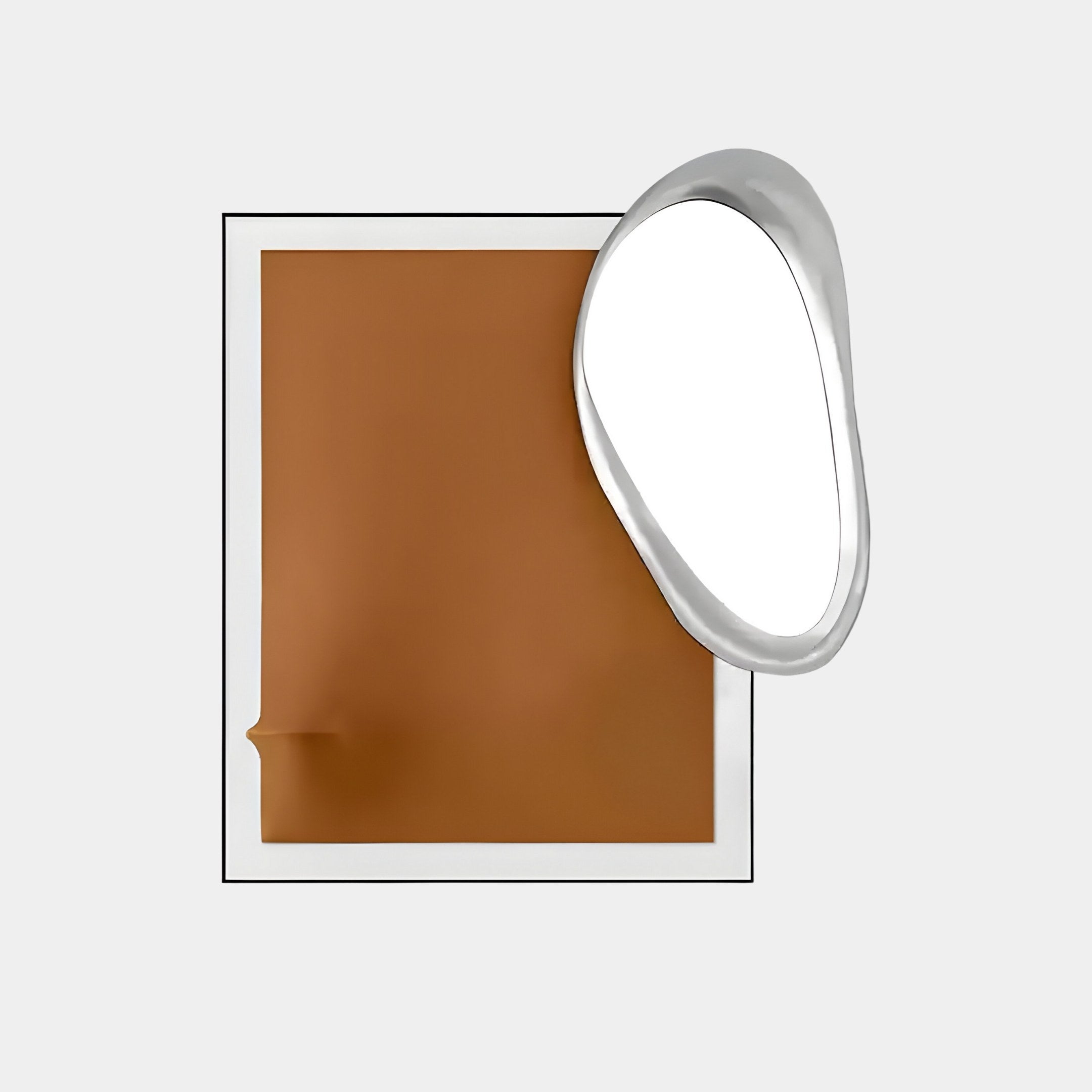 An abstract composition features a brown rectangular sheet with a crumpled edge beside an irregularly shaped silver mirror, reminiscent of the Reflectra Brown Wood Relief 3D Wall Art by Giant Sculptures, all against a minimalist white background.