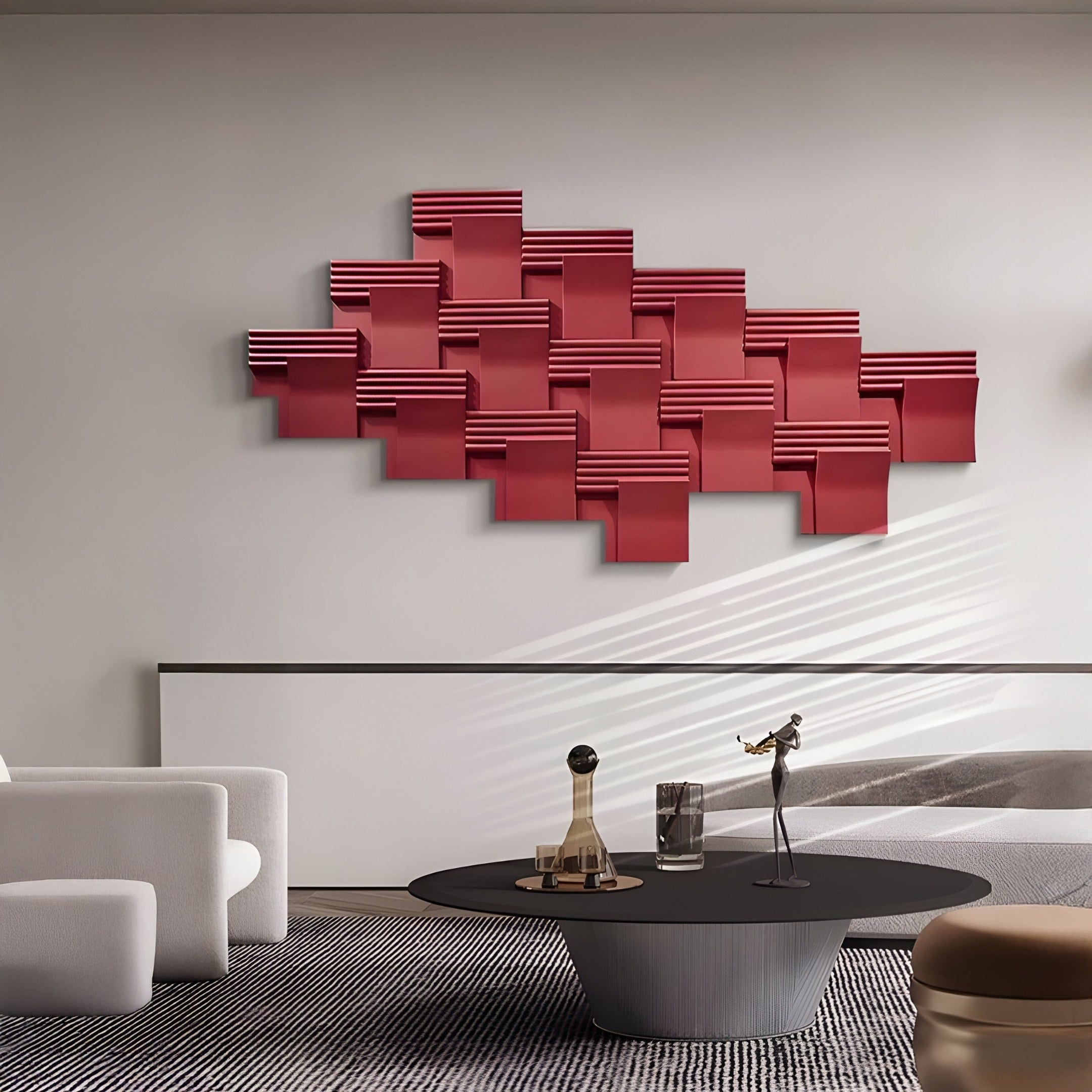 A modern living room highlights Giant Sculptures Axura Red Geometric Wood Relief Hand-Painted 3D Wall Art. It features a round black coffee table with decor, a white armchair, and a textured rug. Sunlight streams in from the side, creating a calming atmosphere.