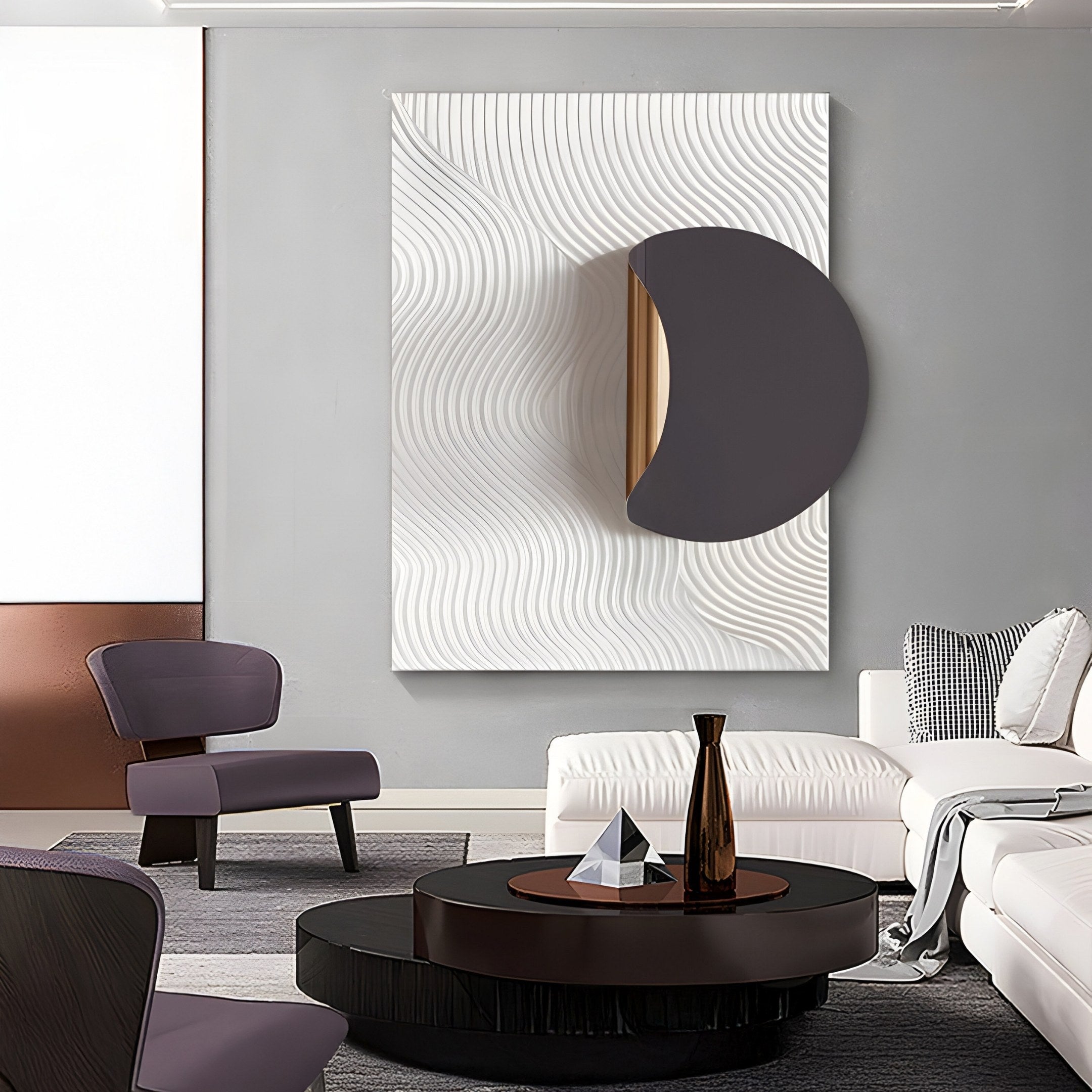 The modern living room is styled with abstract wave-patterned art and a semi-circle sculpture, featuring a white sofa, dark round coffee table, geometric decor, and a plush chair. The centerpiece is the Solvara Charcoal Grey & White Wood Relief 3D Wall Art by Giant Sculptures.