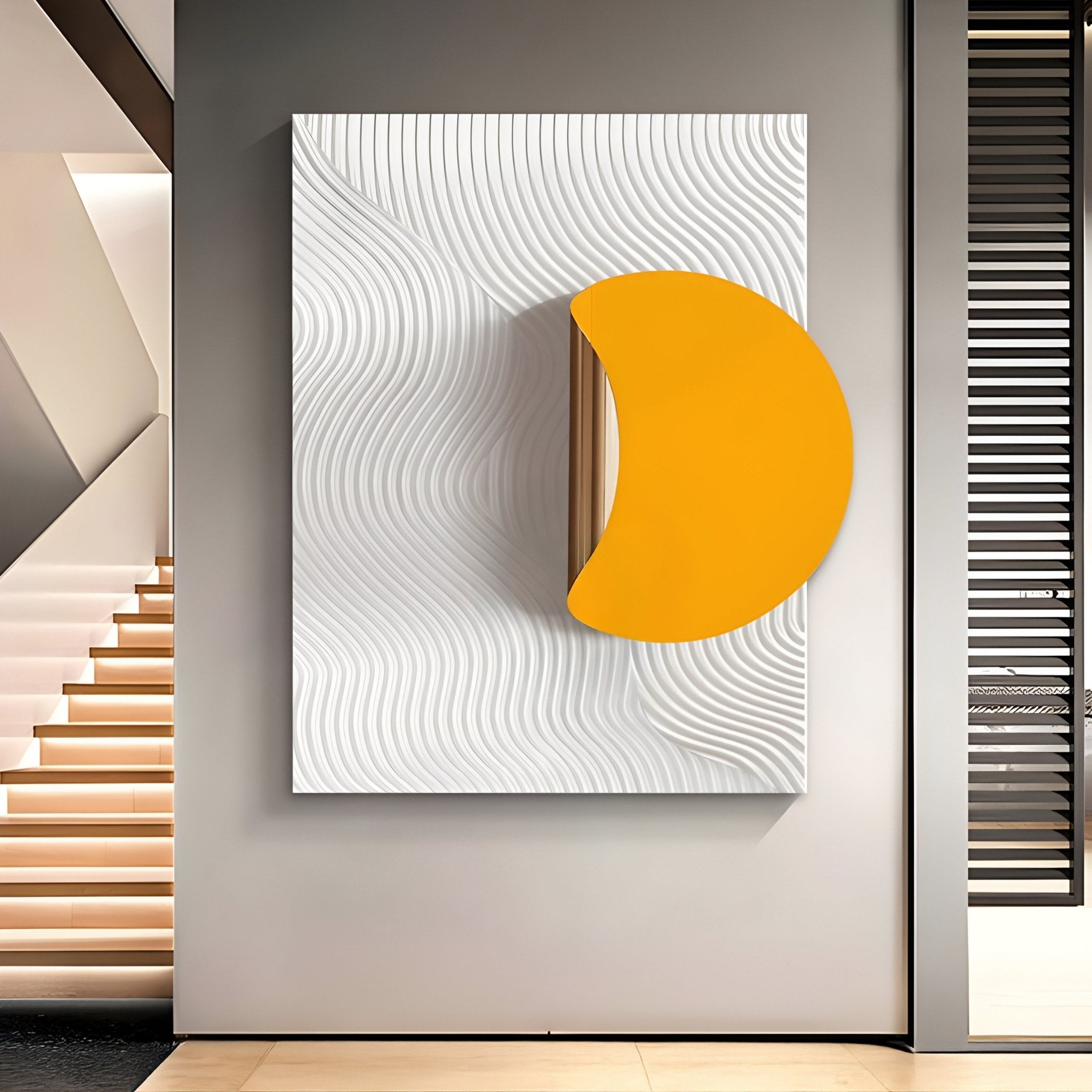 Giant Sculptures Solvara Yellow & White Wood Relief 3D Wall Art serves as a contemporary centrepiece in a modern room, featuring white wave-textured panels with crescent-shaped yellow-orange 3D elements. On the left is a staircase with wooden steps, and vertical blinds cover a window on the right.