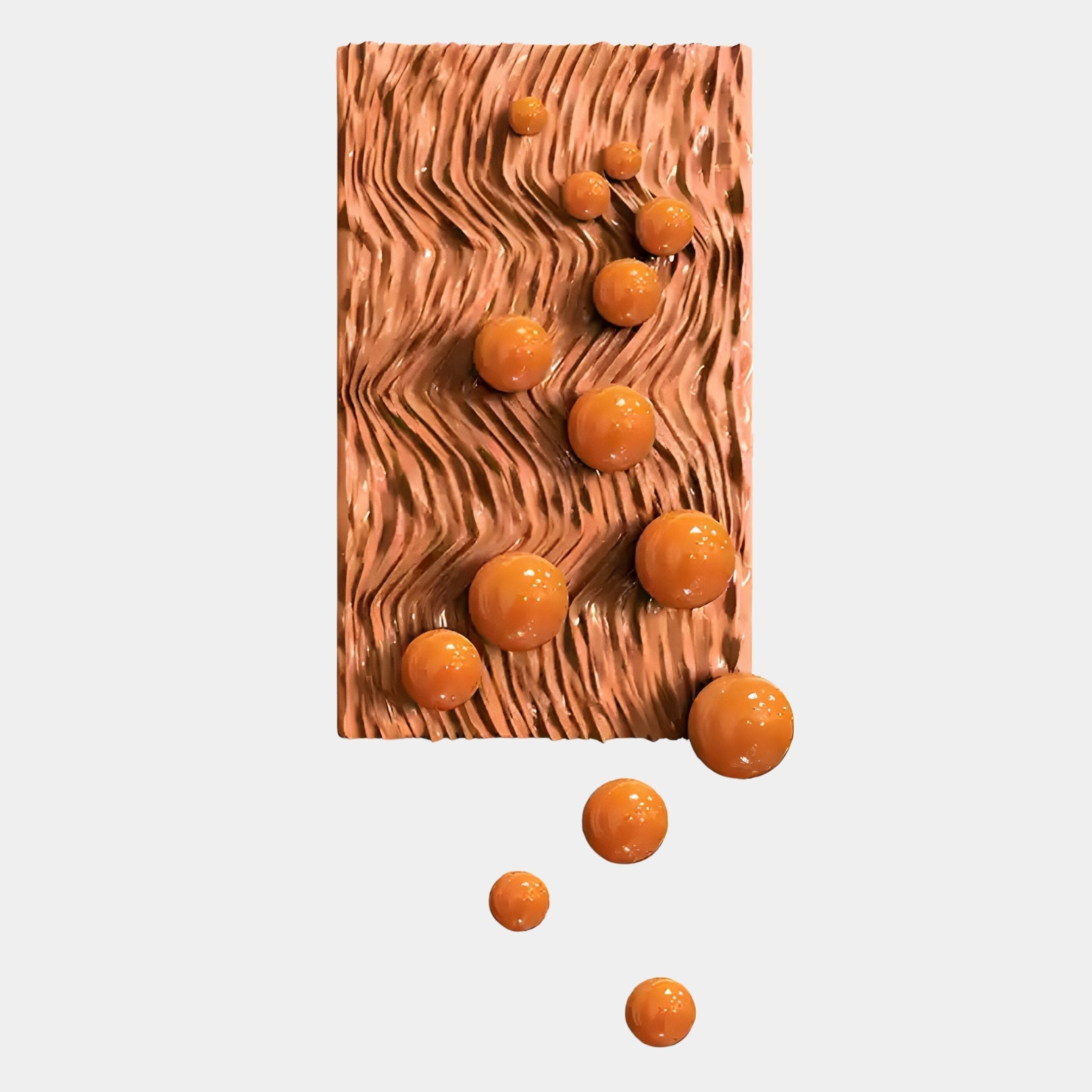 The Fluxion Orange 3D Wood Relief Wall Art With Metal Ball by Giant Sculptures showcases a wavy rectangular surface with glossy metal spheres in diagonal arrangement—an eye-catching modern decor piece on a plain white background.
