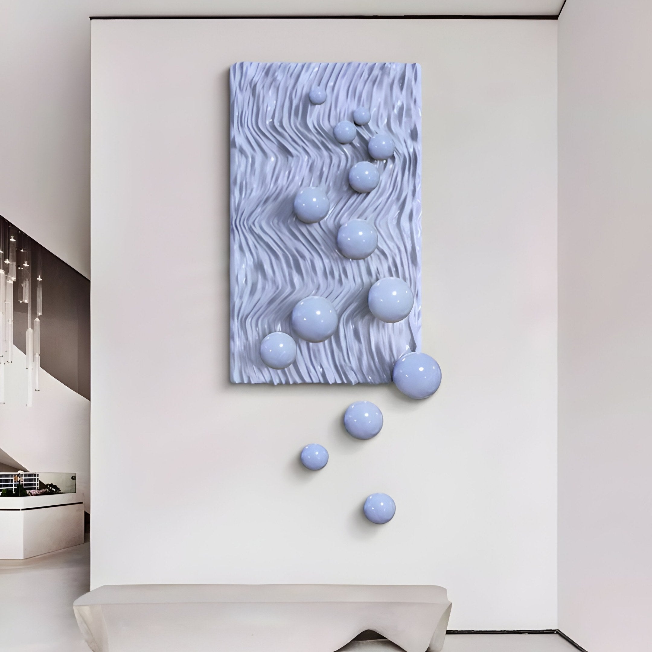 The Fluxion Lavender 3D Wood Relief Wall Art with Metal Ball by Giant Sculptures brings a modern touch to a white wall, featuring textured wave patterns and glossy metal spheres that appear to flow downward, adding dynamic depth to the minimalist space.