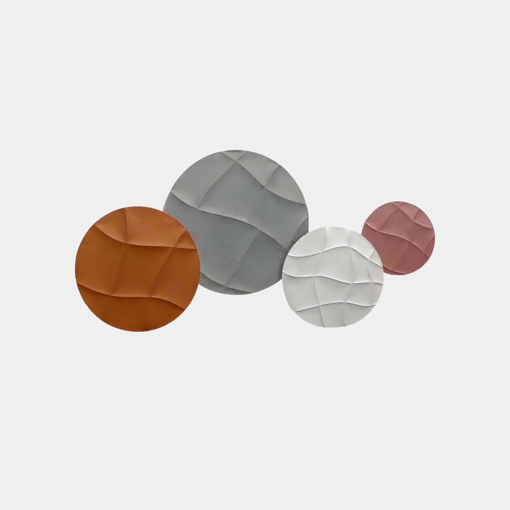 Introducing the Orbita 4-Set Circular Rust & Blush 3D Wood Relief Wall Art by Giant Sculptures, a captivating indoor décor piece. Featuring four crumpled-texture circles in brown, gray, white, and blush pink on a crisp white background, it perfectly blends rust and blush tones for a contemporary touch.