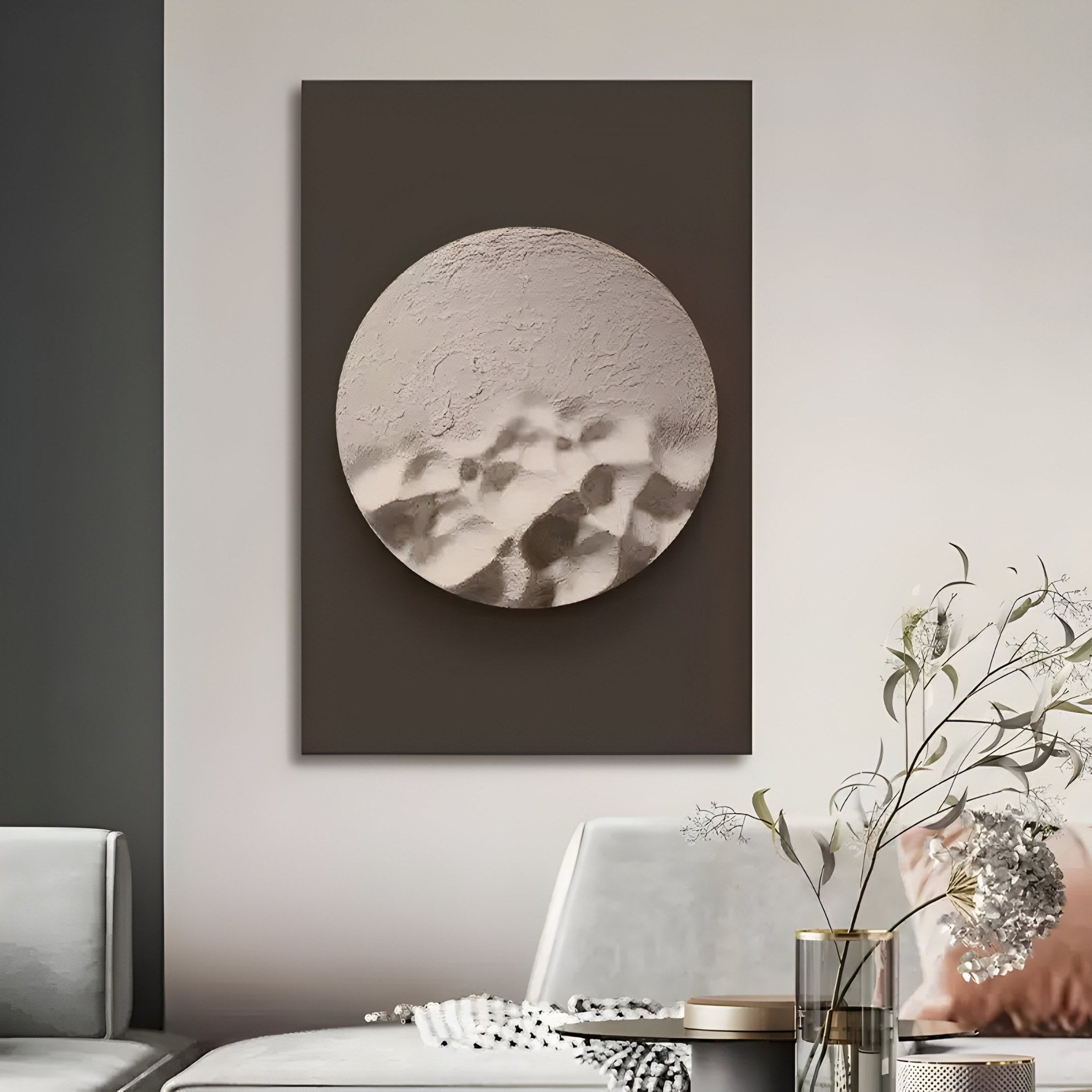 A minimalist room features Giant Sculptures Solivis Desert 3D Wood Relief Wall Art. Below, a sleek white chair and table with a decorative plant enhance the sophisticated, neutral-toned décor.