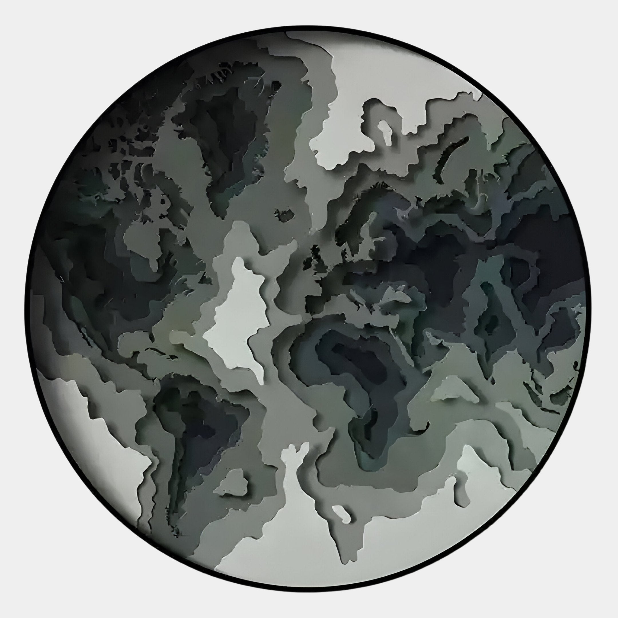 The Terranova Earth Green Round Wood Carving 3D Wall Art by Giant Sculptures features layered, irregular shapes in gray, black, and green for a nature-inspired, topographic effect on a white background.