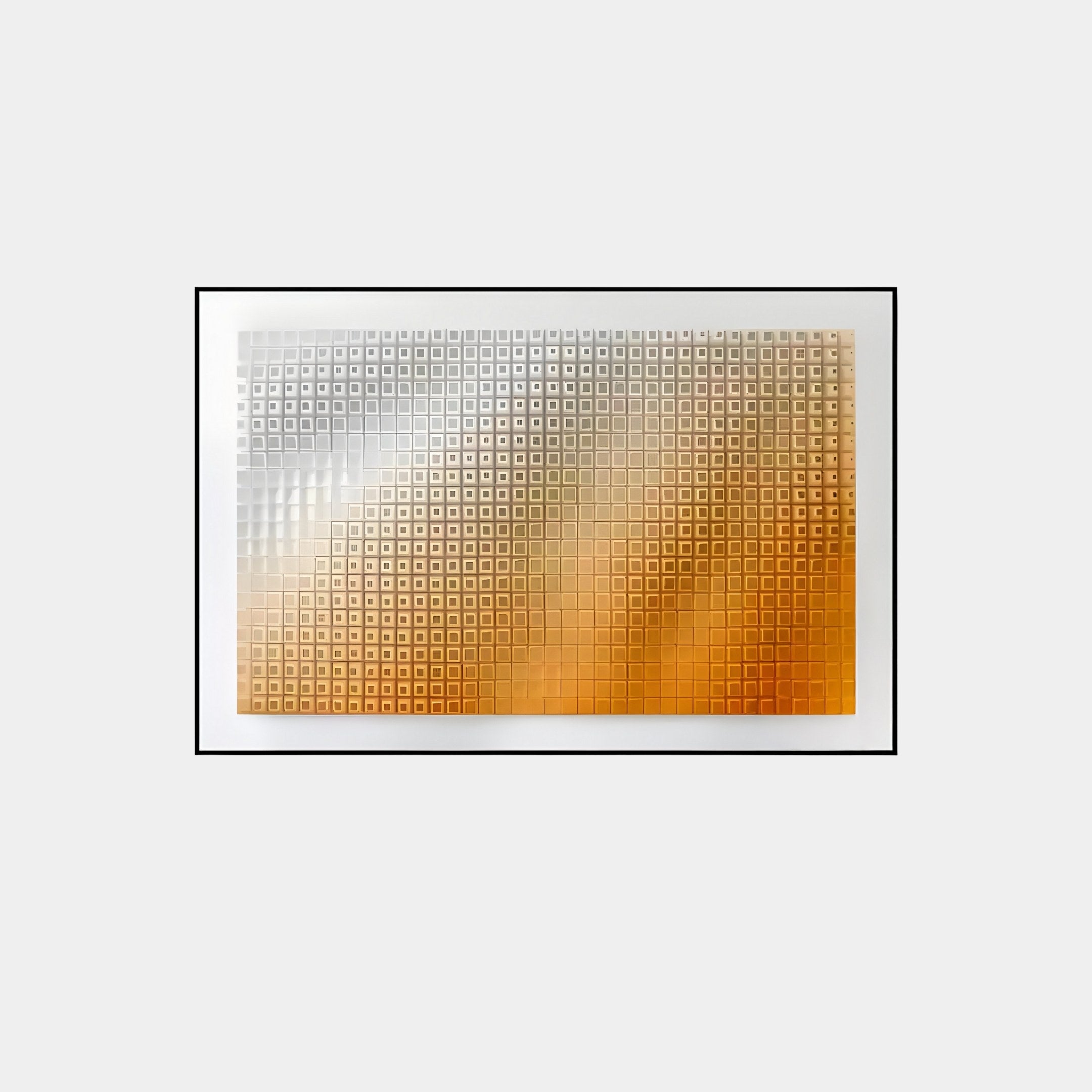 The Elytrum Orange Grid Gradient Hand-Painted Wood Relief 3D Wall Art by Giant Sculptures showcases a gradient of small squares from silver to gold on a white backdrop with a black border, capturing attention with its striking visual depth and intricate design.