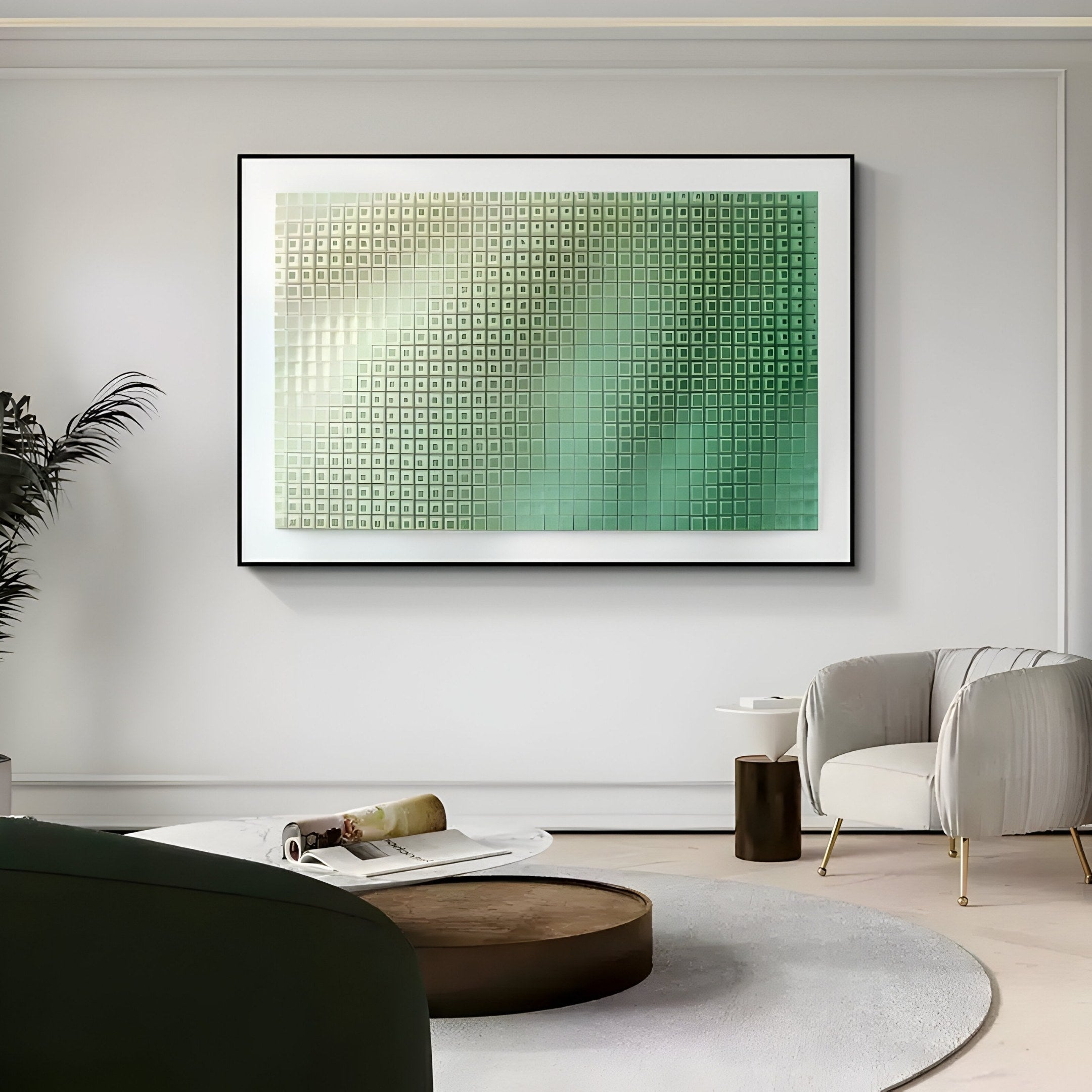 A modern living room displays the Elytrum Green Grid Gradient Hand-Painted Wood Relief 3D Wall Art by Giant Sculptures. The space includes a circular coffee table, plush chair, and a plant-adorned side table, all within an elegantly neutral-toned setting.