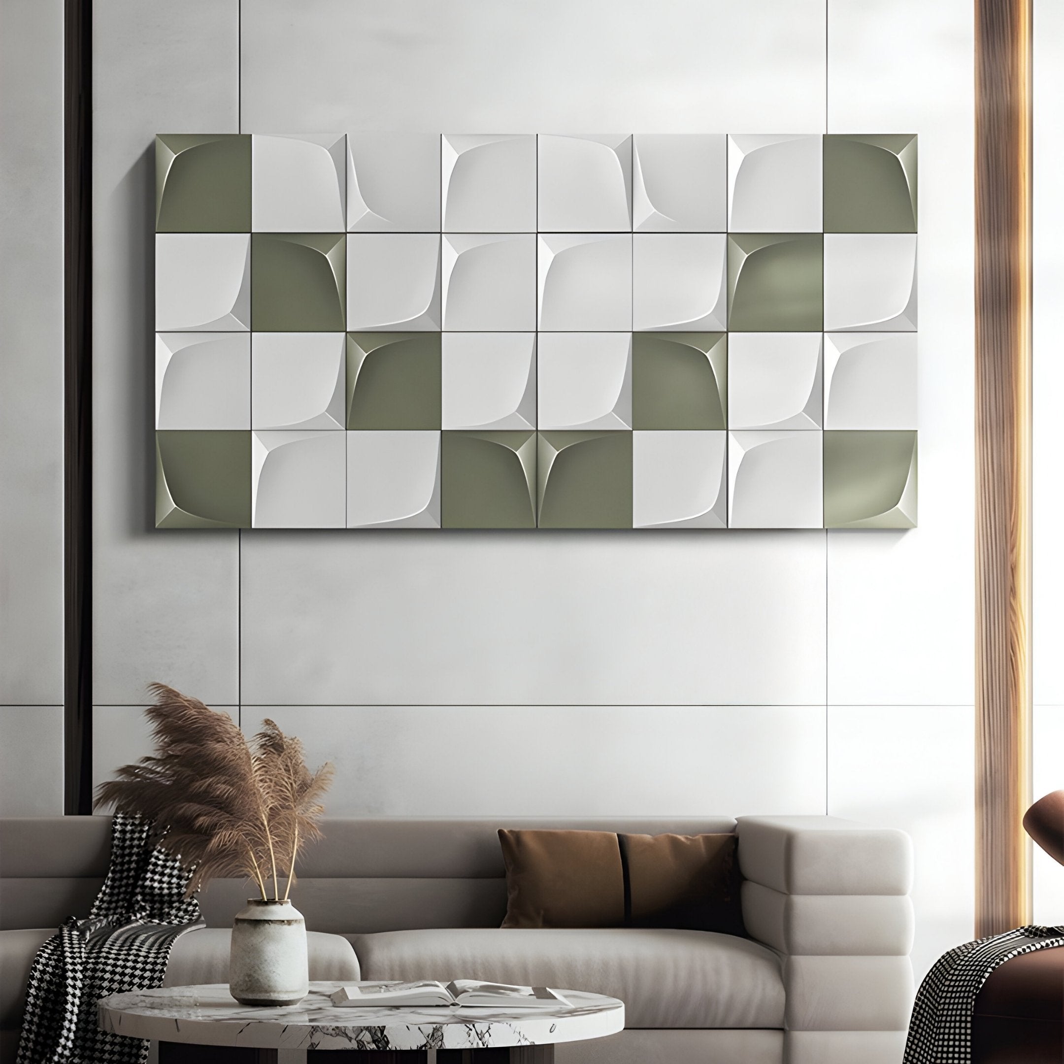 In a modern living room, the Averra White & Sage Geometric Wood Relief 3D Wall Art by Giant Sculptures adds depth with its striking design. Below, a light gray tufted sofa is adorned with beige and brown cushions. A vase of pampas grass graces the checkered cloth-topped table, completing the chic look.
