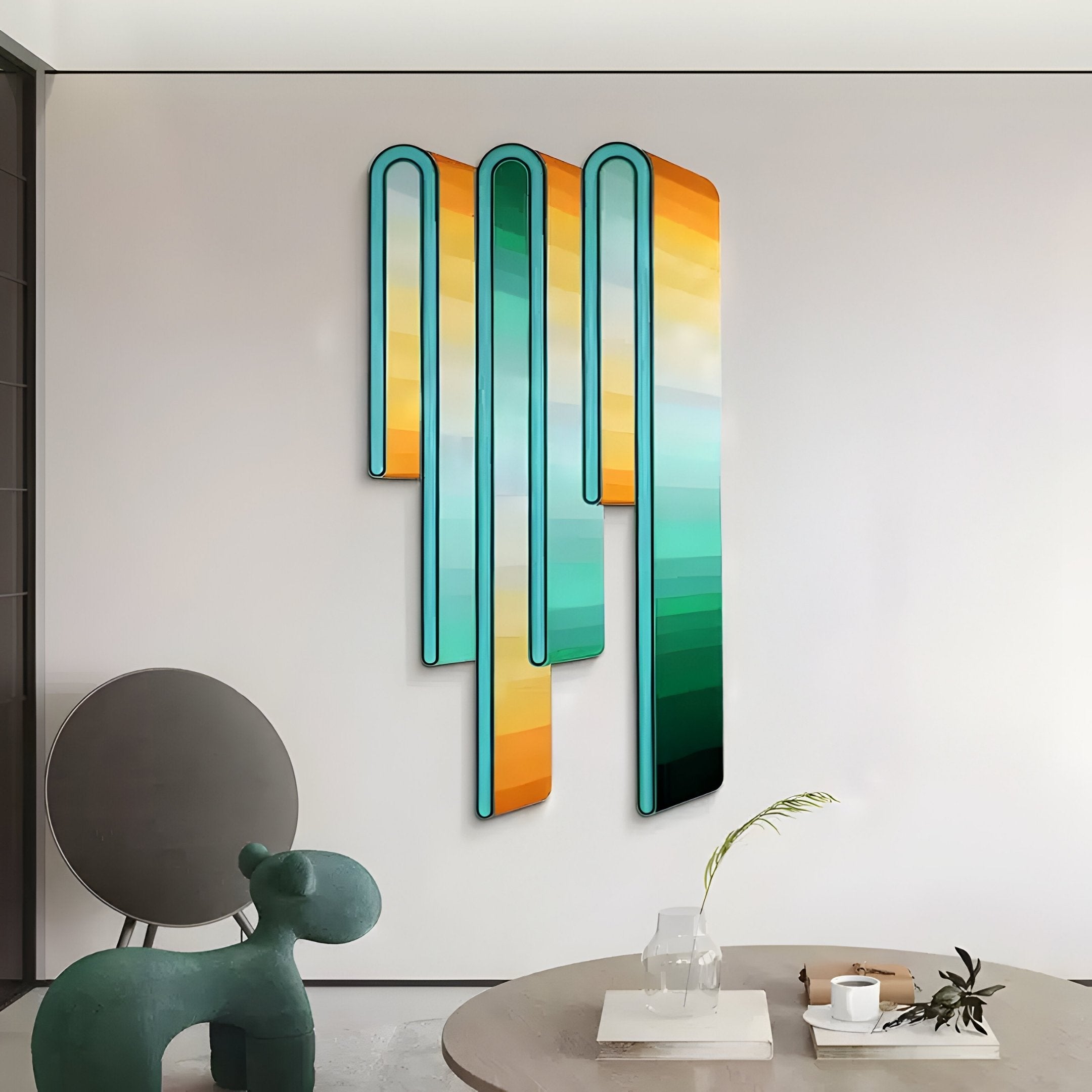 A modern interior showcases Giant Sculptures Opaline Gold Emerald Gradient Wood Relief 3D Wall Art with vertical, wavy panels in teal, yellow, and orange. Complementing it is a round table with a plant and sculpture. A gray swivel chair nearby adds to the contemporary vibe.