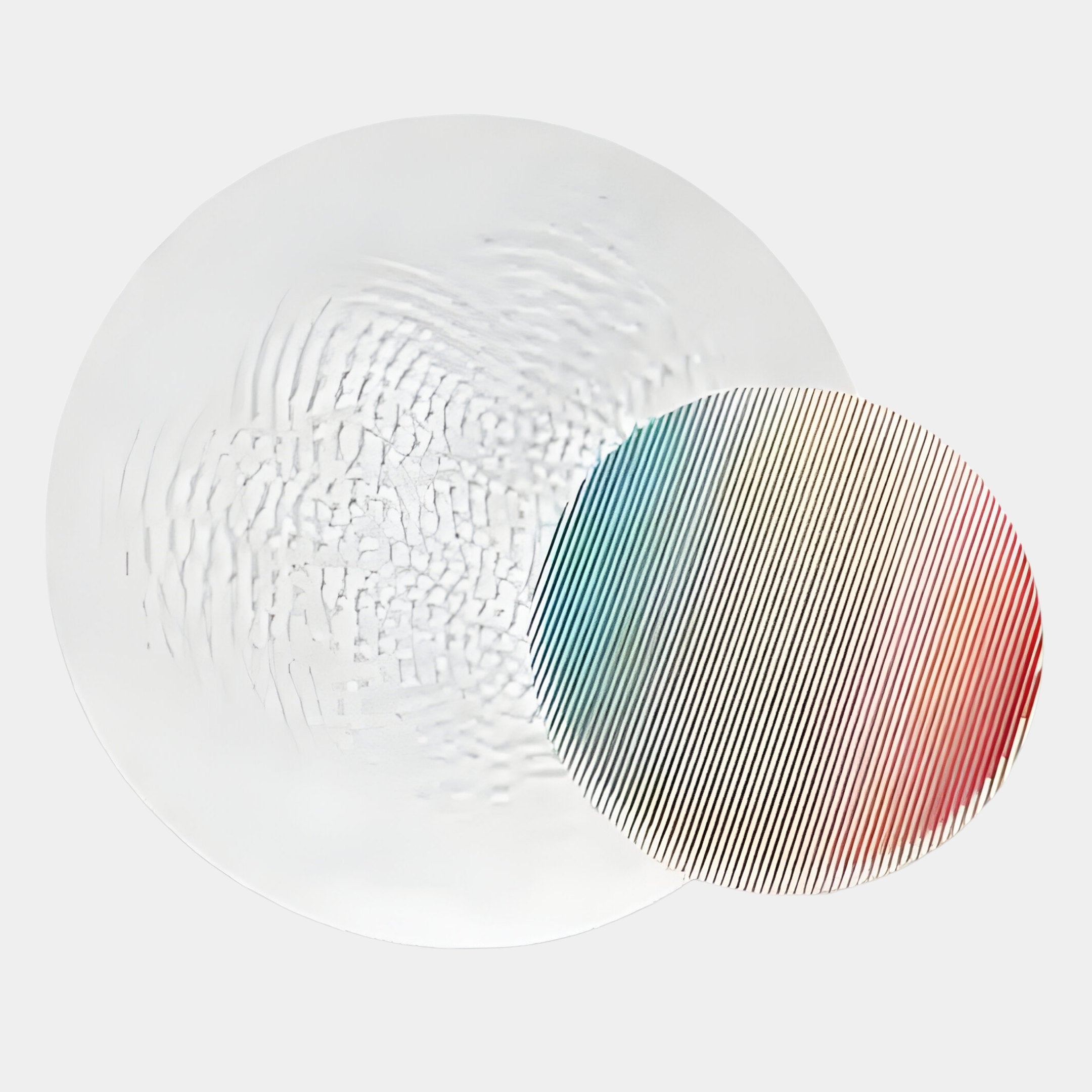 The Lucentis White & Pastel Gradient Wood Relief 3D Wall Art by Giant Sculptures features a large translucent wavy disc overlapping a smaller circle with fine diagonal lines and pastel blue, green, and red hues on a light gray background.
