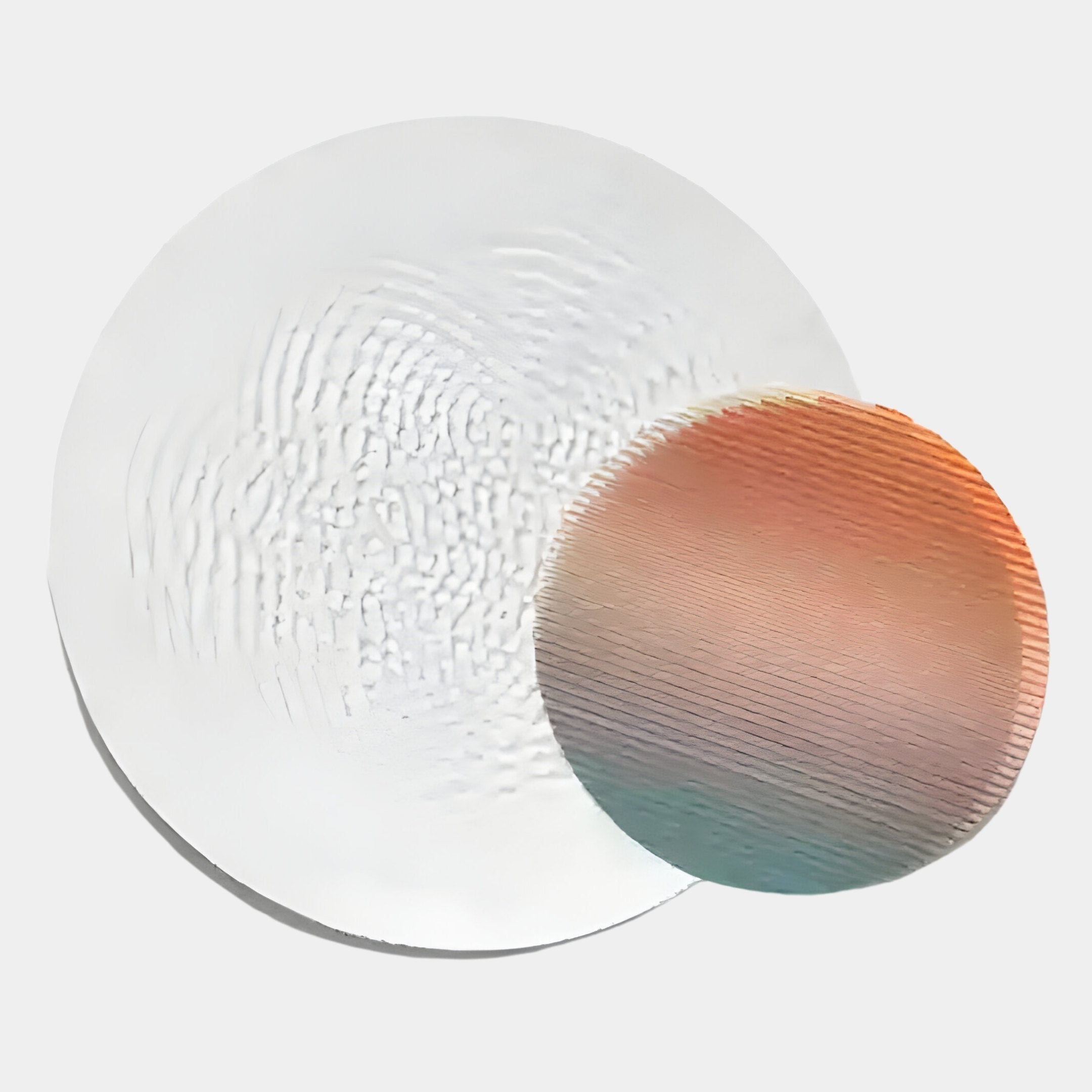 Giant Sculptures’ Lucentis White & Sunset Gradient Wood Relief 3D Wall Art features a large, semi-transparent white disc with a wavy wood texture and a smaller disc in sunset pastels of orange, pink, and blue with horizontal lines.