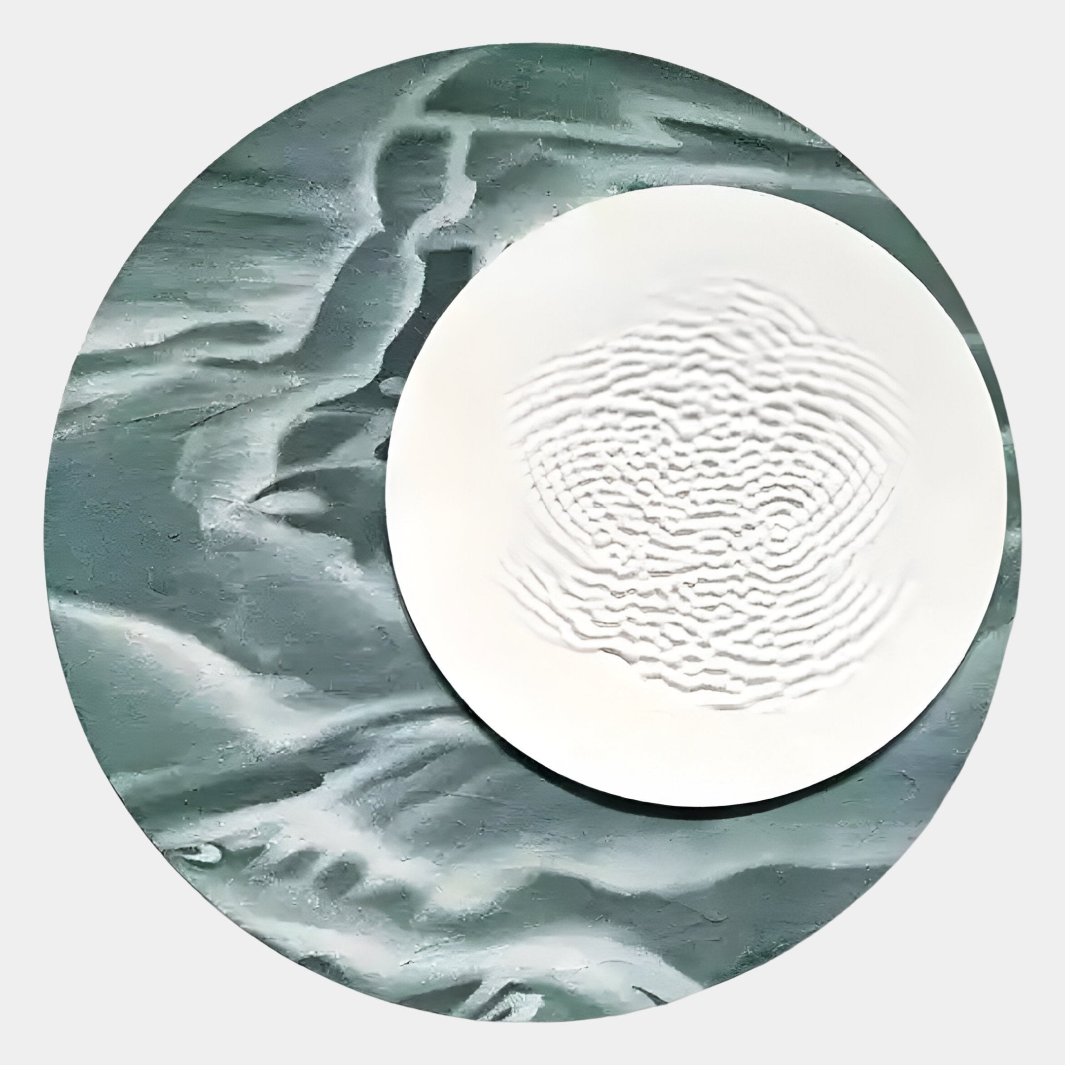The Reveria Moss Green Abstract Wood Carving 3D Wall Art by Giant Sculptures features a round wavy moss green background with a central white circular plate, showcasing a ripple-textured pattern for modern wall décor.