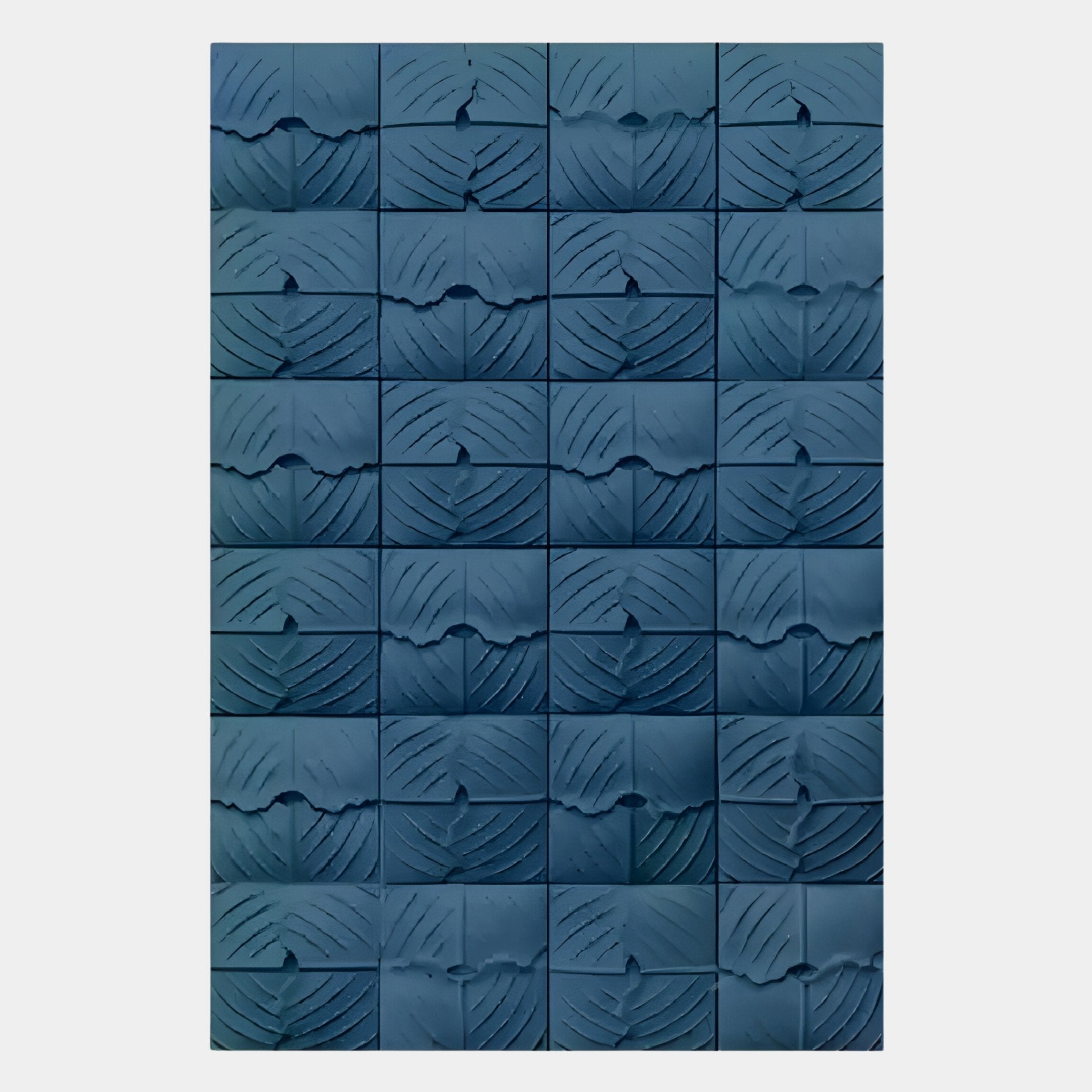 The Vellura Blue Textured Wood Relief 3D Wall Art by Giant Sculptures features a grid of blue, square tiles with abstract patterns, forming a striking geometric design against a white background.