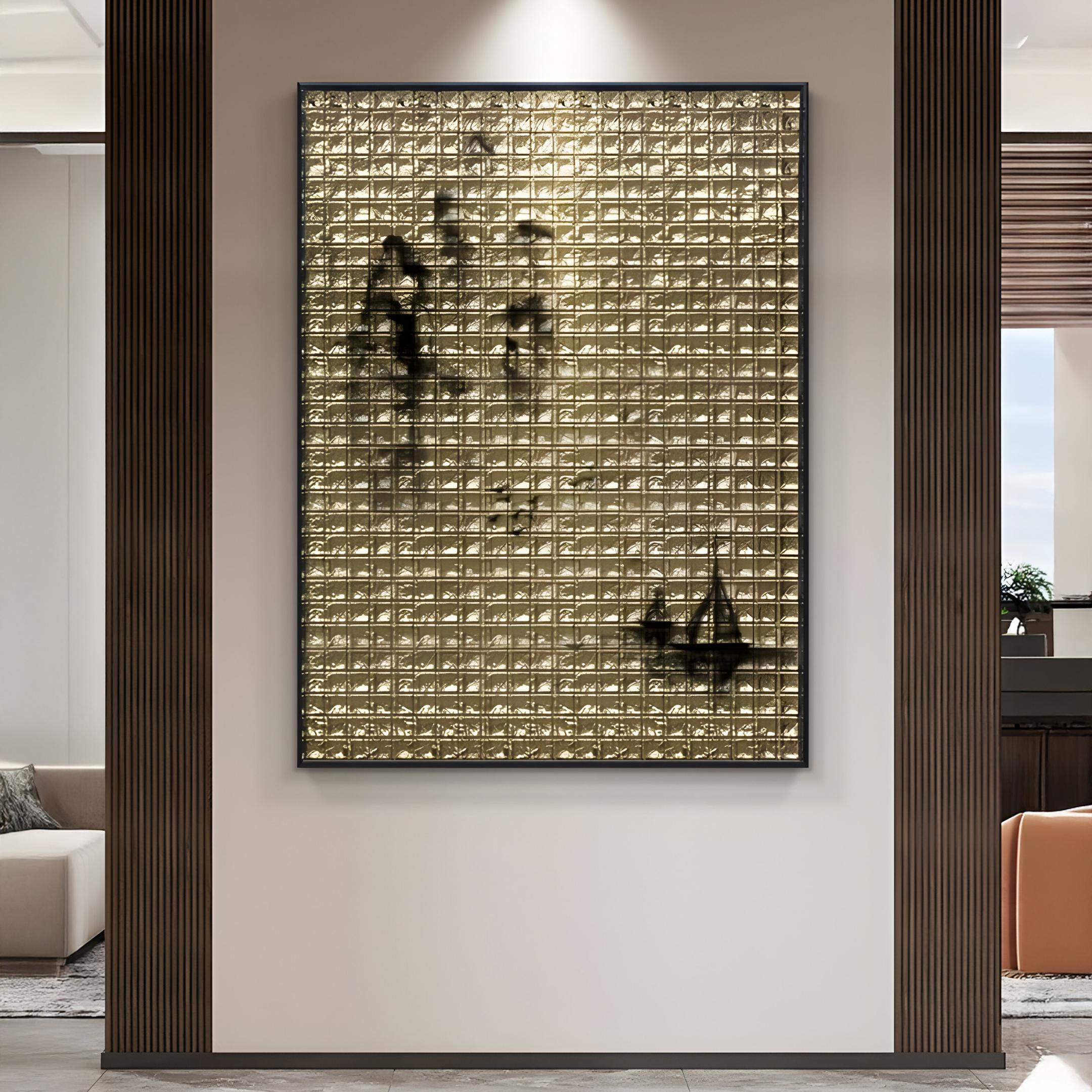The Synova Gold II Hand-Painted Wood Relief 3D Wall Art by Giant Sculptures, featuring a grid of golden squares and Zen-inspired black splotches, adorns a wall between vertical wooden panels in a modern minimalist living space with neutral tones.