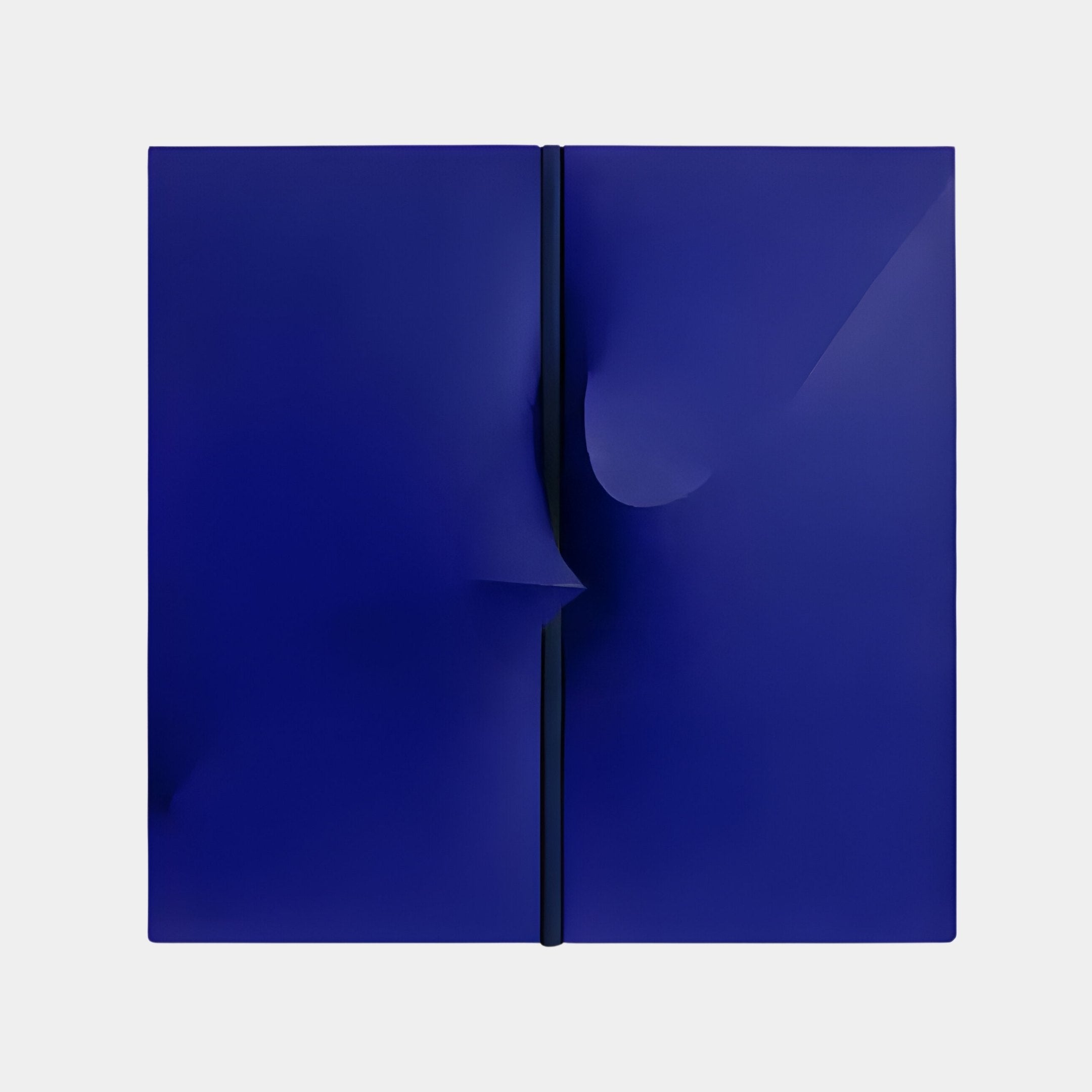 The Delinea Sapphire Blue Stretch Fabric 3D Wood Relief Wall Art by Giant Sculptures features two adjacent sapphire blue panels on a light gray background, with a subtle vertical crease for a gentle fold effect, making it a striking piece for modern interiors.