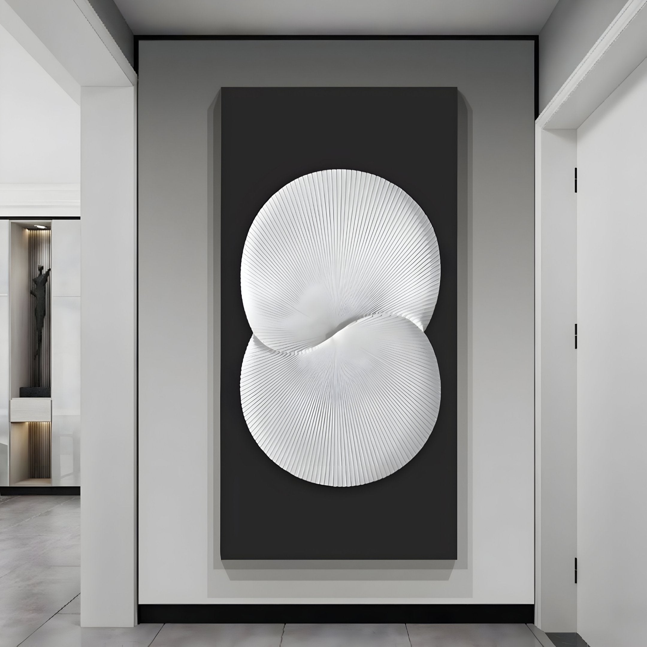 The Artivio Black & White Wood Relief 3D Wall Art by Giant Sculptures showcases a modern geometric three-dimensional white abstract design on a dark background. Its mounted in a minimalist, brightly lit room with white walls and floors.