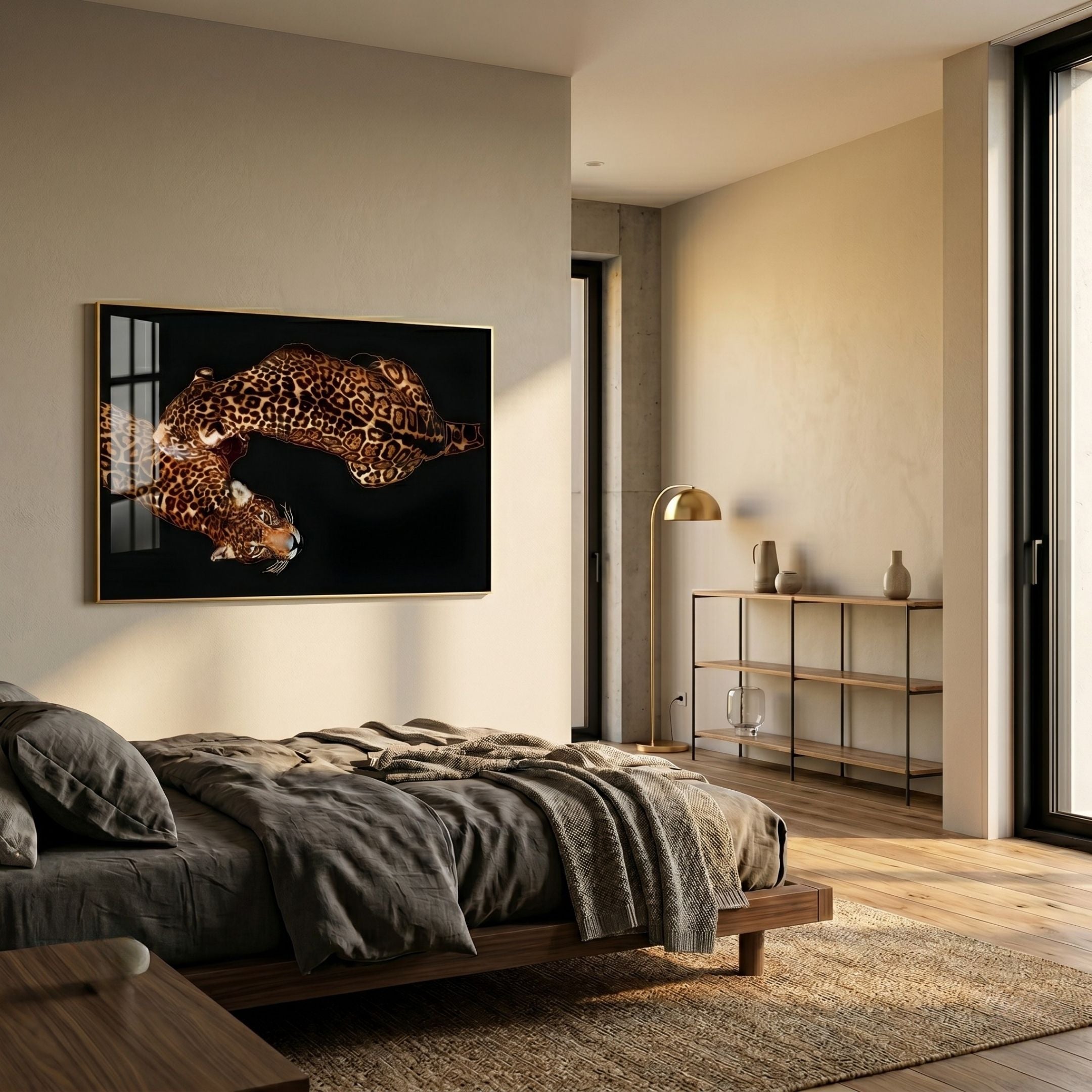 Auravalor Twin Leopards Crystal Porcelain 3D Wall Art in gold frame above a wooden bed with grey linens in a warm neutral bedroom with brass floor lamp.