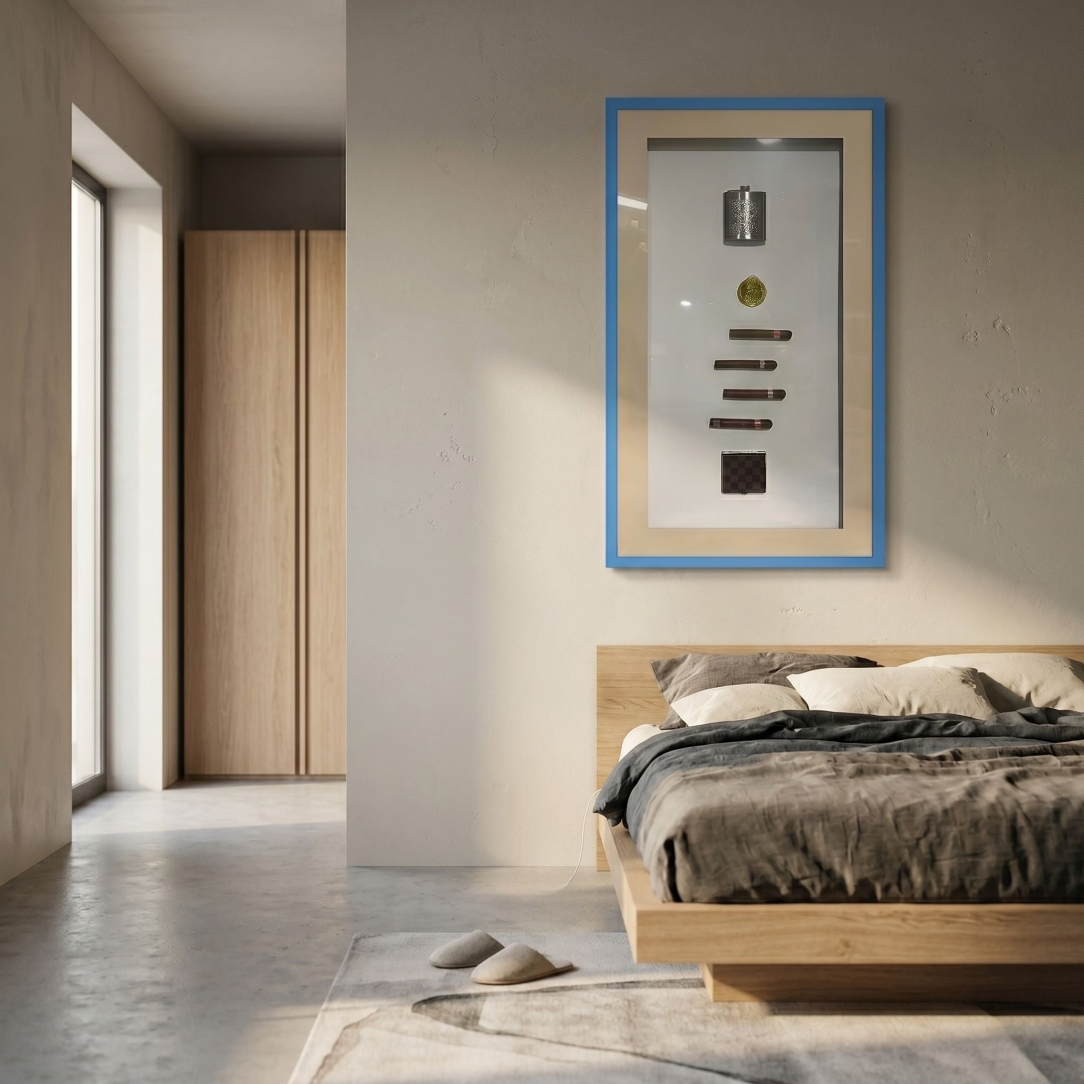 Vitara Silver Flask & Gold Seal Cigar Framed 3D Wall Art by Giant Sculptures displayed on a cream bedroom wall above an oak bed with grey linens.