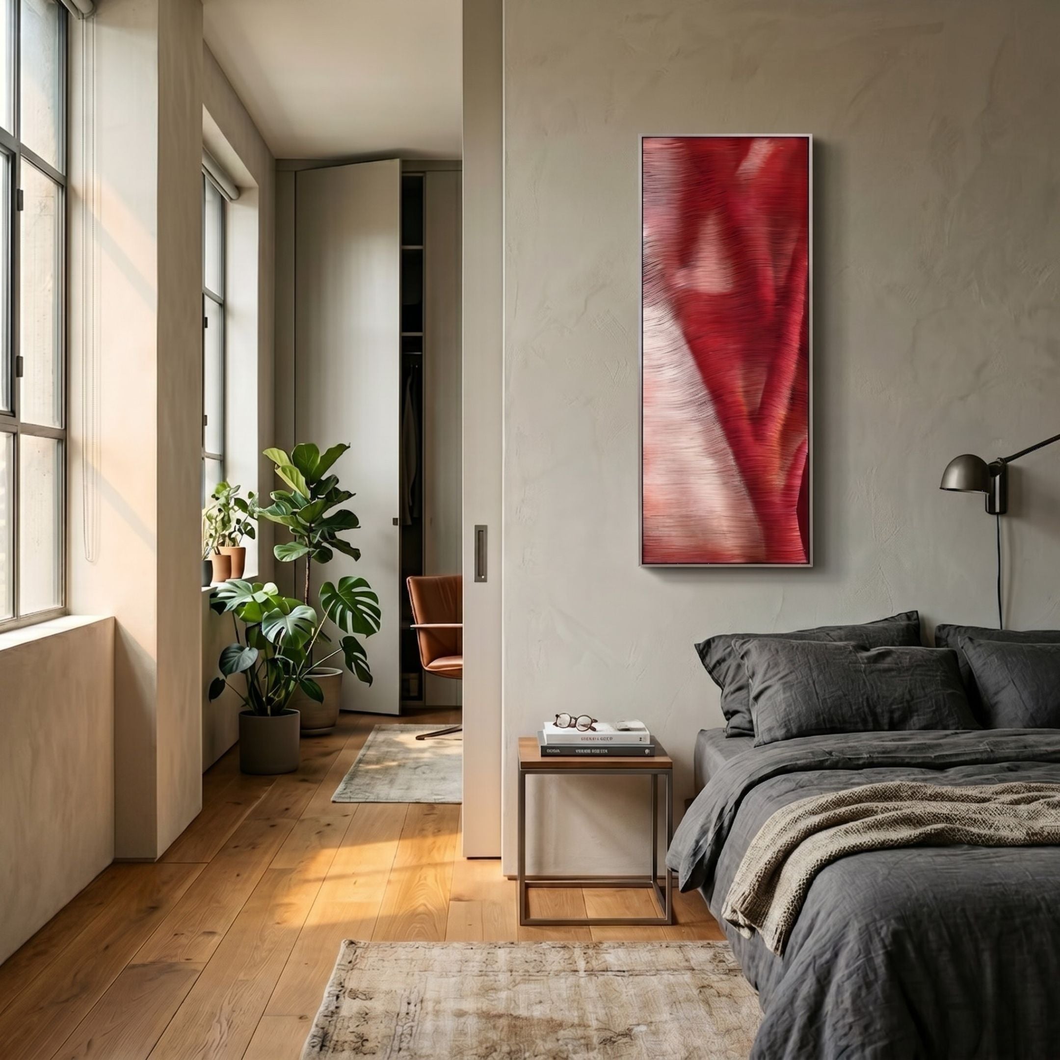 Rivara Crimson Wave Vertical Hand-Painted Rope 3D Wall Art in pink to burgundy tones, mounted above a nightstand in a modern bedroom with grey linens.