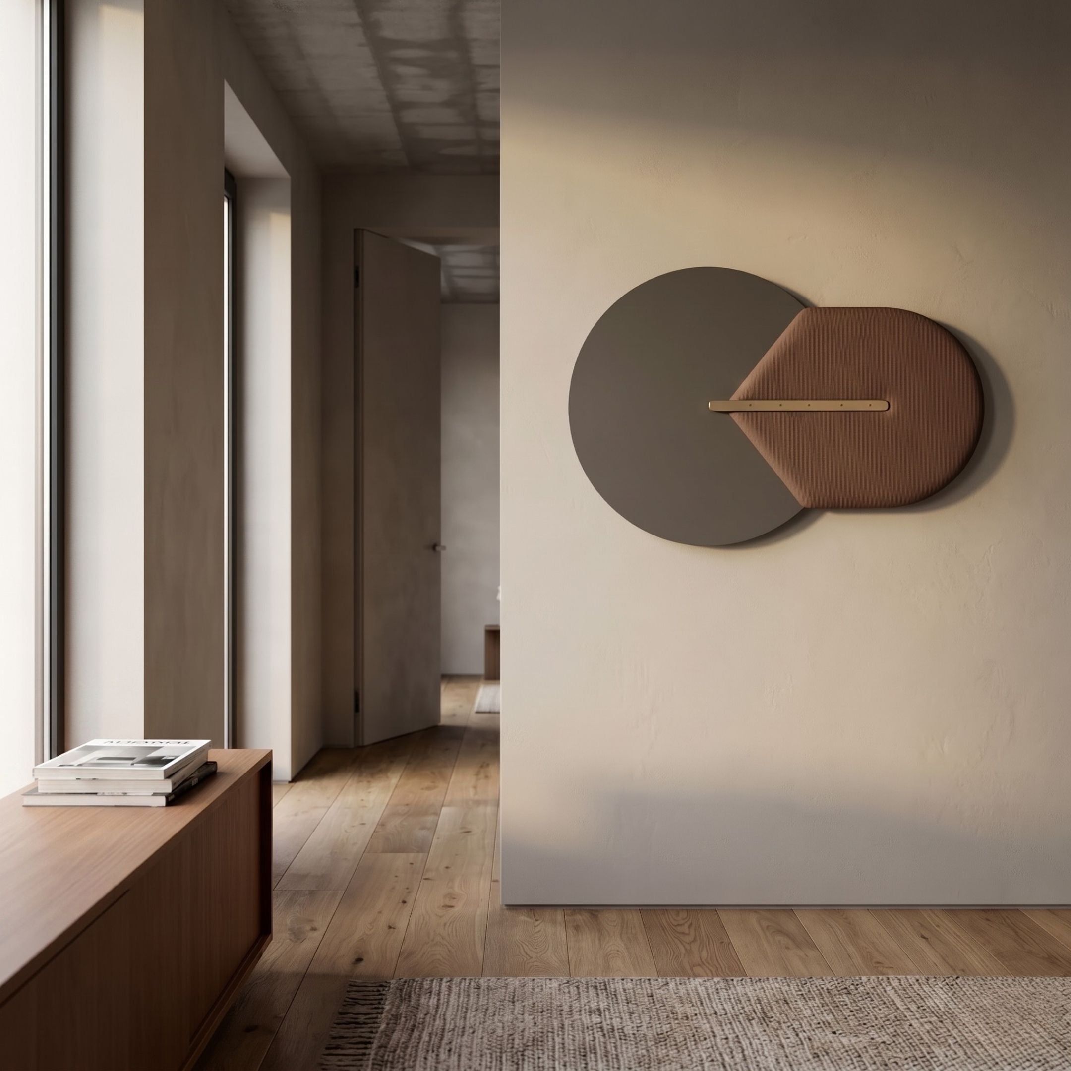 Solvia Brown & Grey Layered Geometry 3D Wall Art by Giant Sculptures, mounted in a hallway with a walnut console, showing overlapping grey disc and brown textured panel divided by a slim gold strip.