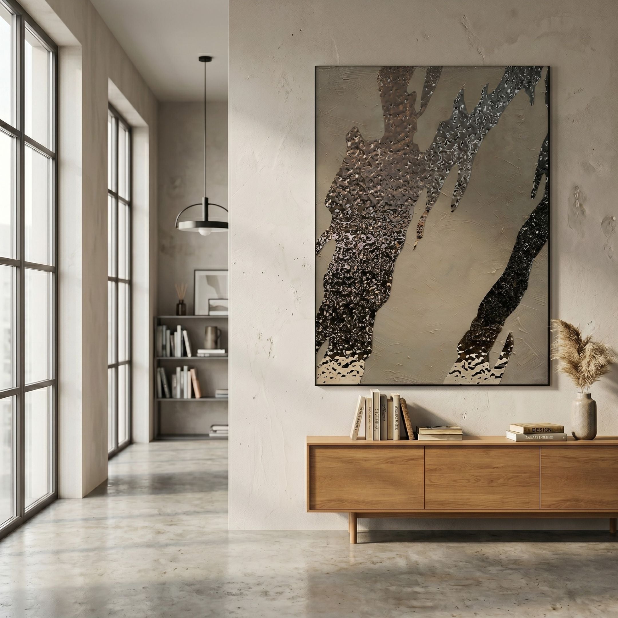 Metallura Beige & Silver Metallic Flow Abstract 3D Wall Art by Giant Sculptures displayed above a wooden sideboard in a modern hallway with concrete floors.