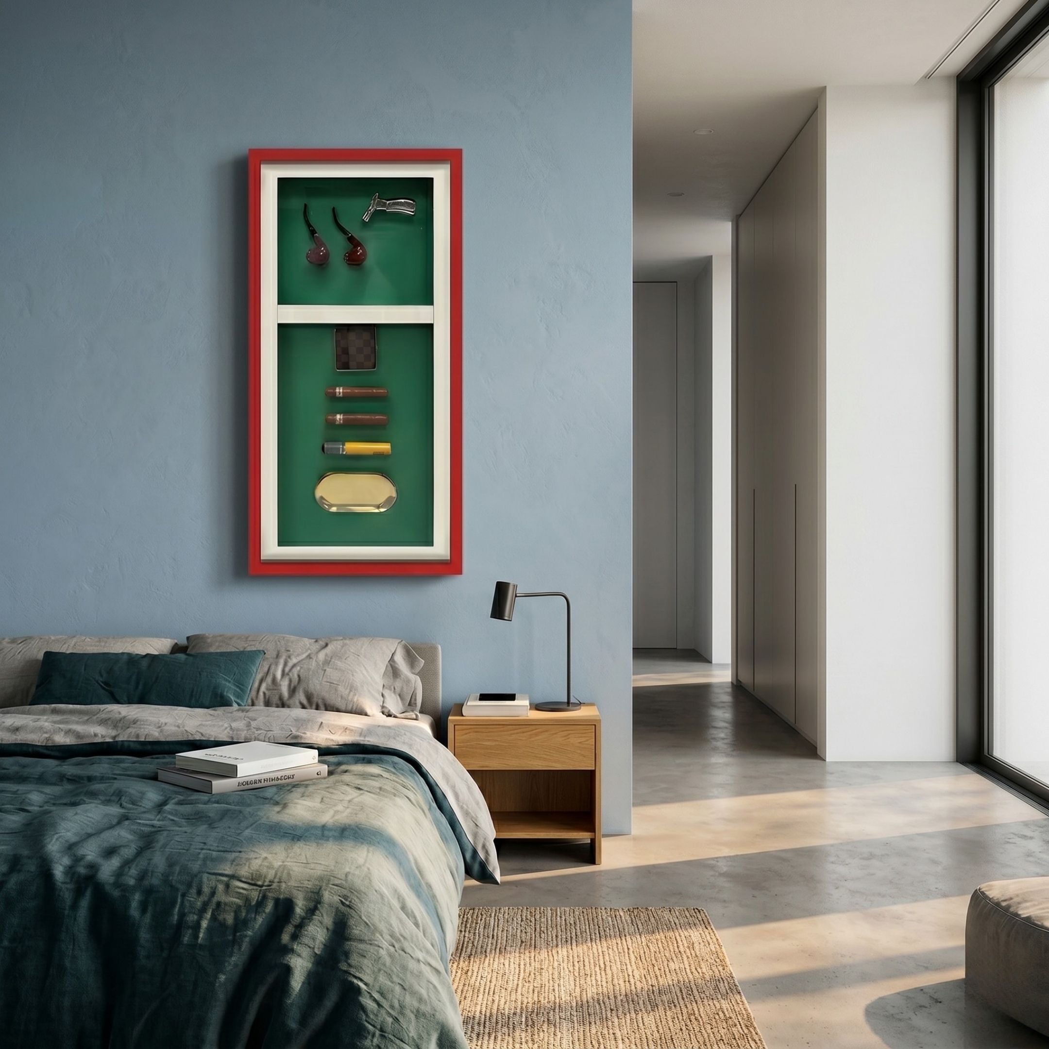 Cavendor Pipe, Torch & Cigar Green Framed Wall Art in red frame displayed on a blue bedroom wall above a wooden nightstand beside a grey bed.