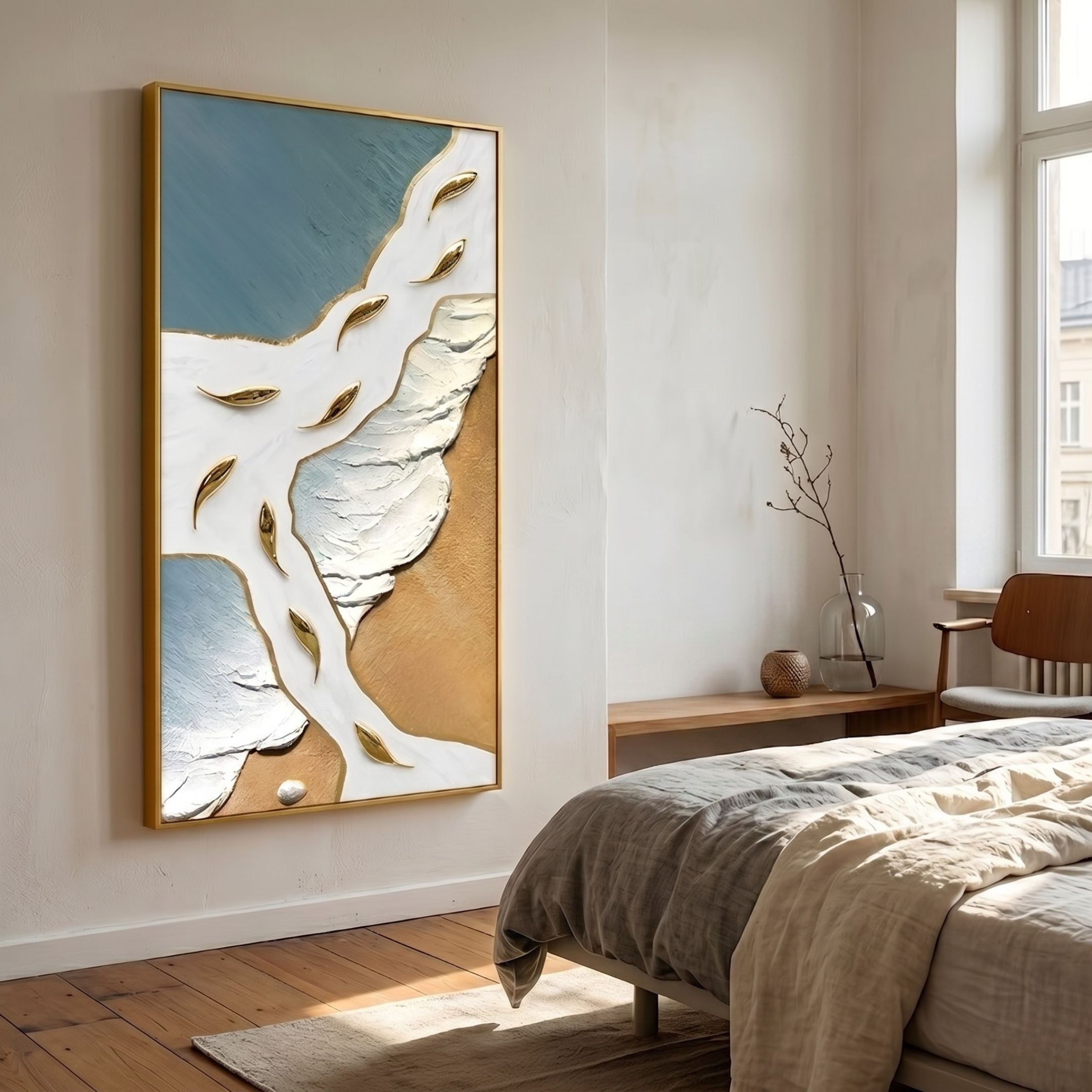 Pisaro Gold Fish Blue Shore & White Oil Canvas 3D Wall Art by Giant Sculptures, gold-framed and mounted in a sunlit bedroom beside a linen-dressed bed.