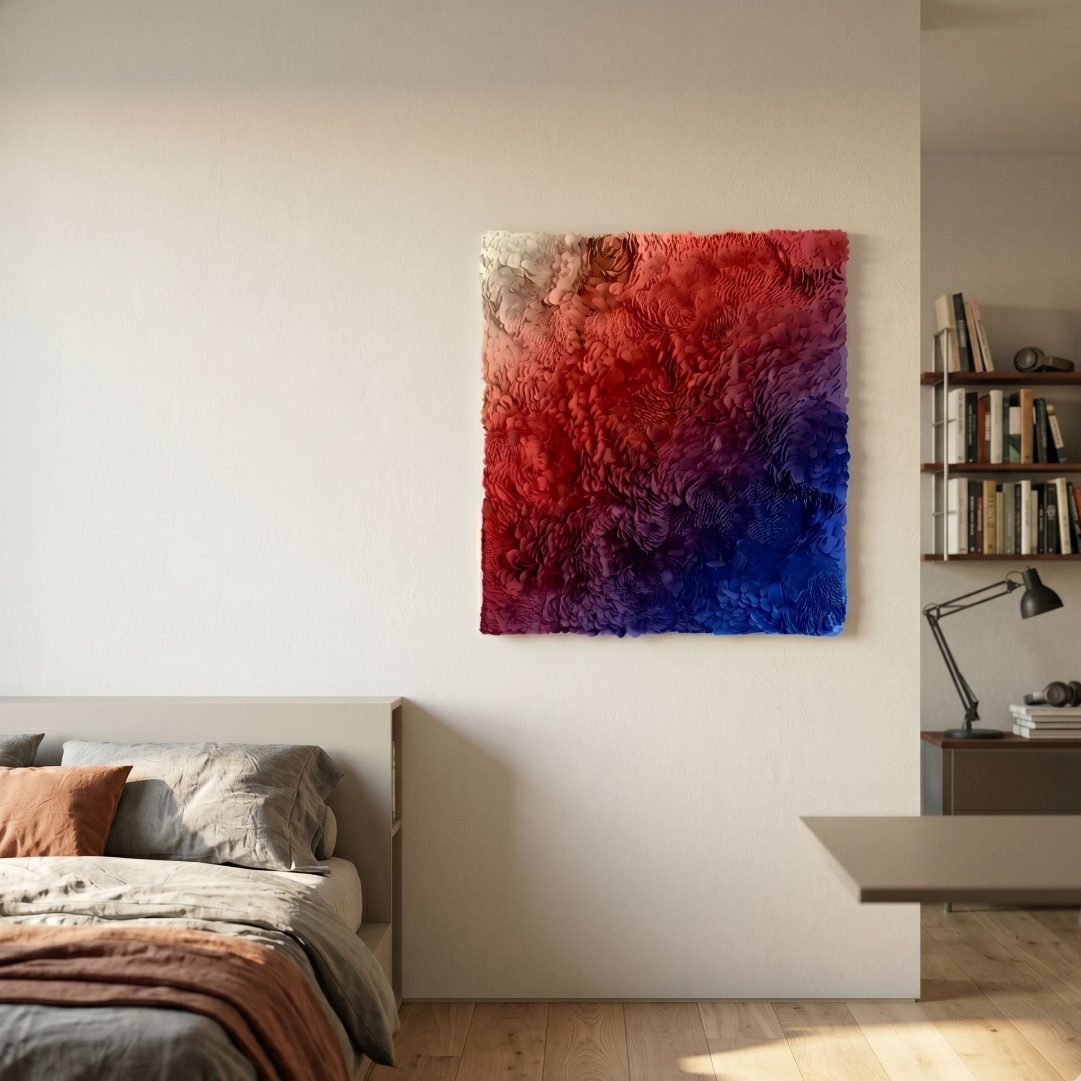 Auralith Rouge-Blue Fade Layered Leather & Acrylic 3D Wall Art by Giant Sculptures displayed on a bedroom wall above a bed beside a bookshelf and desk.