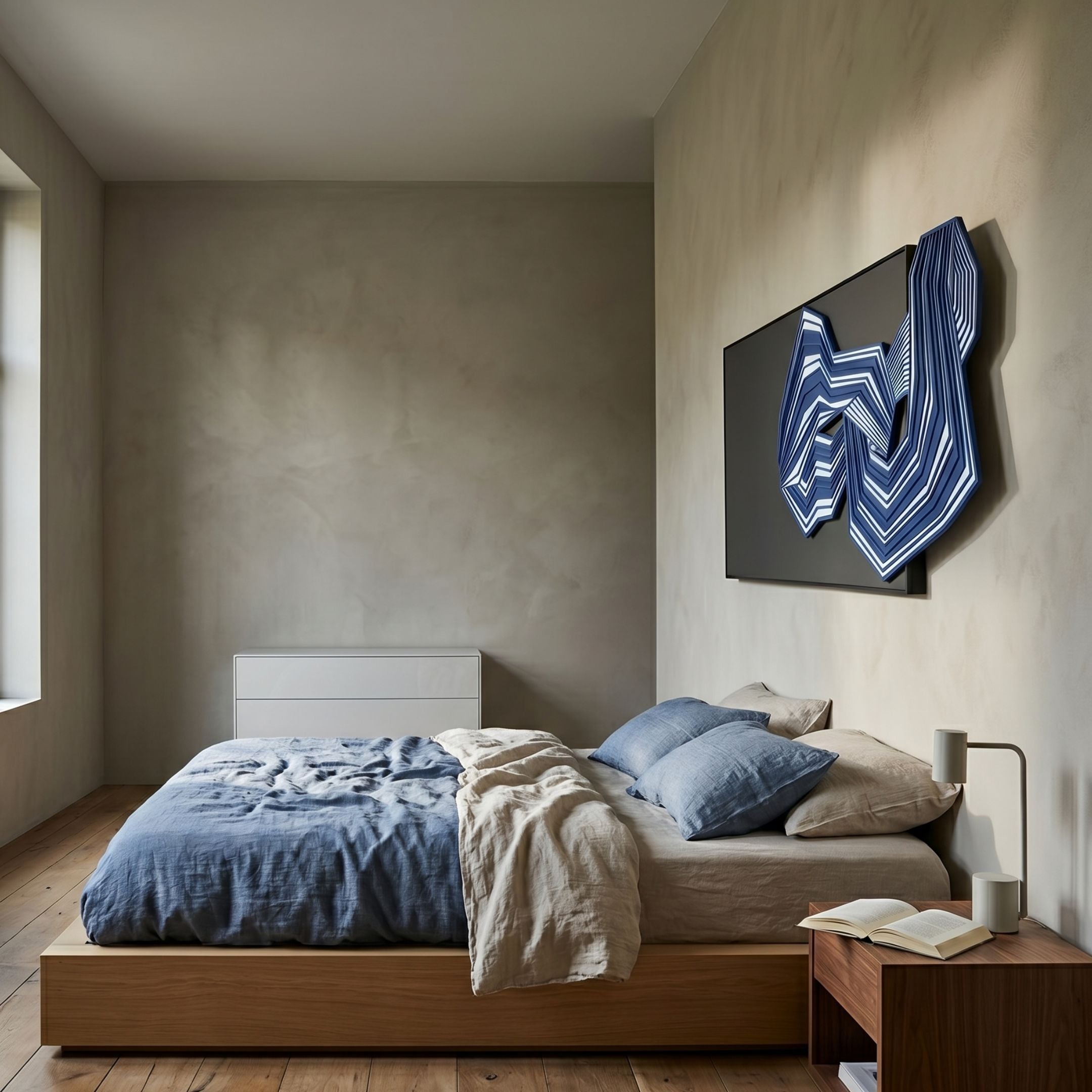 Riborra Black & Blue Layered Wood Carving 3D Wall Art by Giant Sculptures mounted above a wooden bed with blue and linen bedding in a modern bedroom.