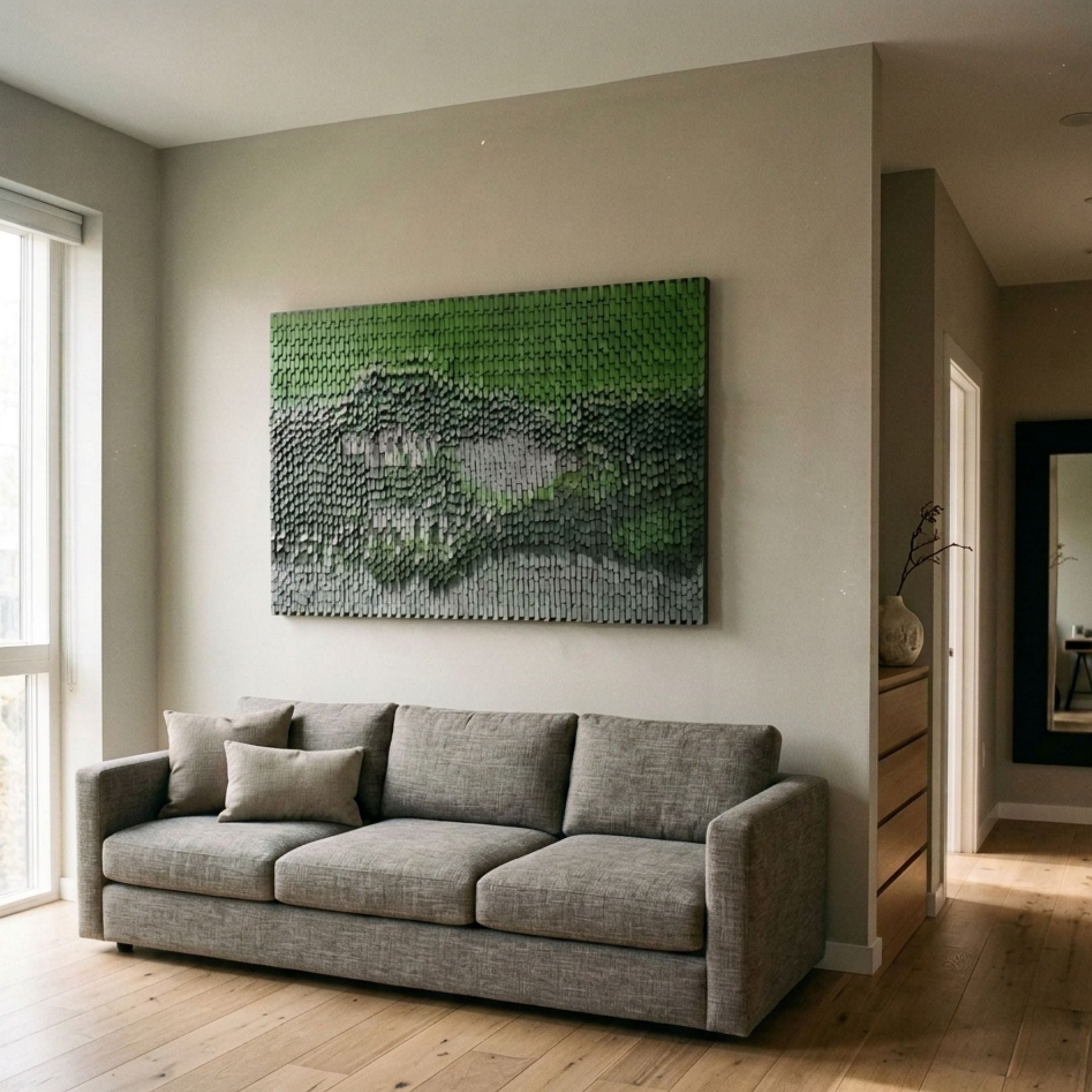 Varentis Green Ombre Layered Leather 3D Wall Art by Giant Sculptures displayed above a grey sofa in a modern living room with oak flooring.