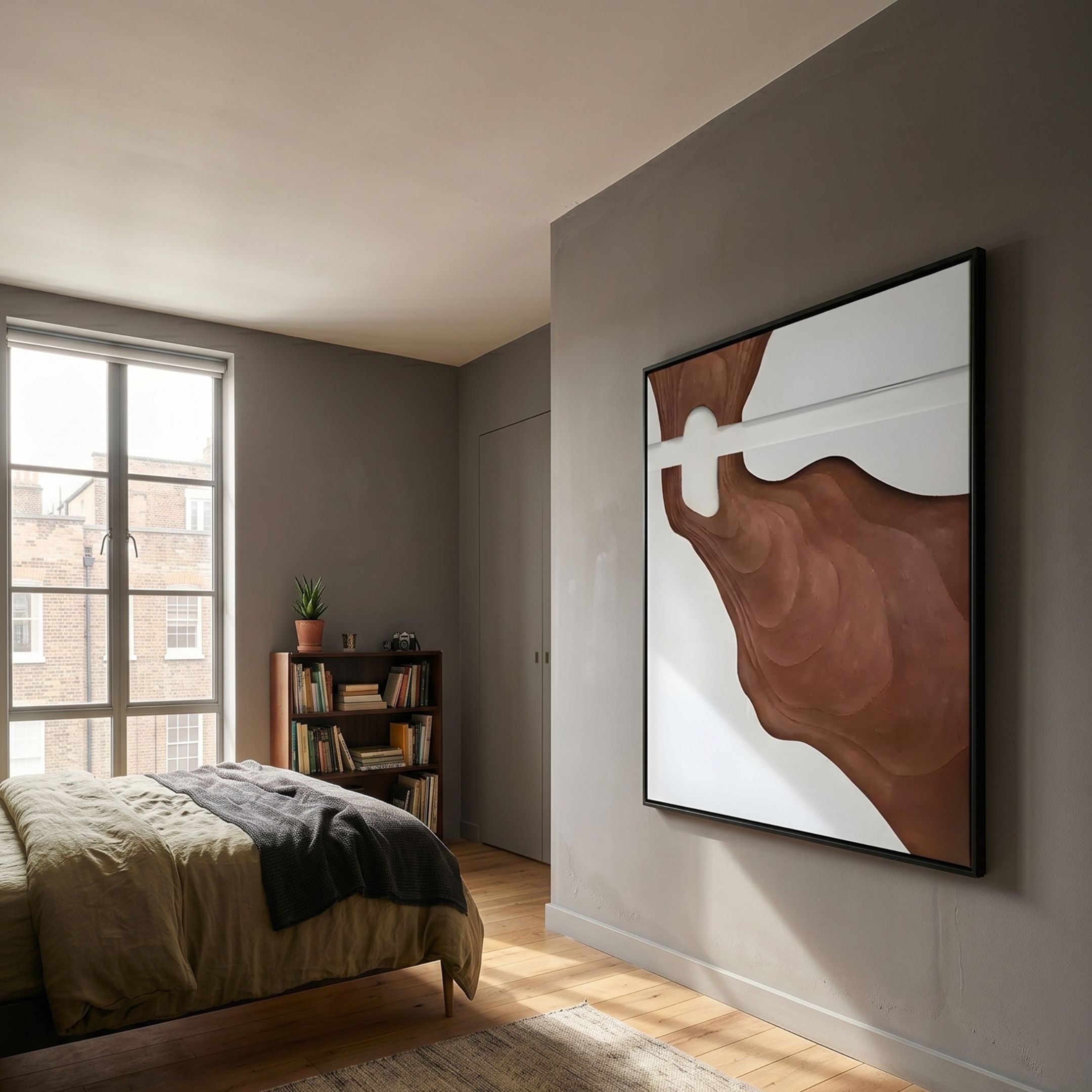 Fluvien Brown Flow 3D Carving Wall Art by Giant Sculptures mounted on a grey bedroom wall beside a bookshelf, bed, and window with daylight.