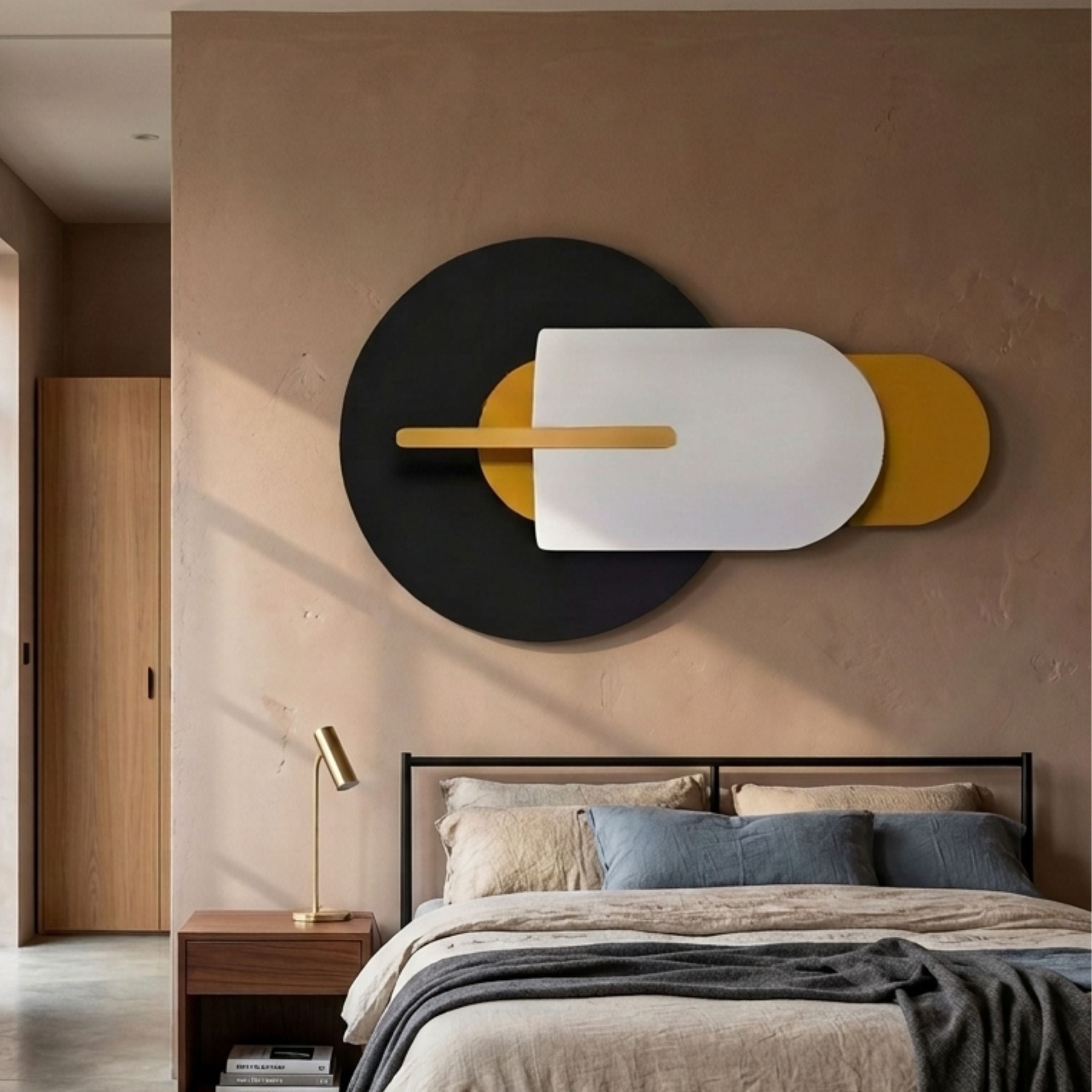 Orbitale Mustard & White Geometry Wood Carving 3D Wall Art by Giant Sculptures mounted above a black-framed bed with brass lamp and walnut nightstand.