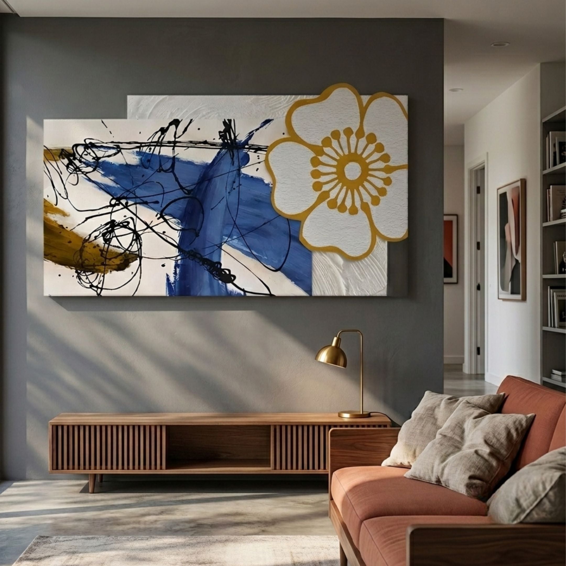 Bloomark Saffron Floral Abstract Texture 3D Wall Art with cobalt blue brushstrokes, black ink drips and a raised white-and-gold bloom, above a wooden console.