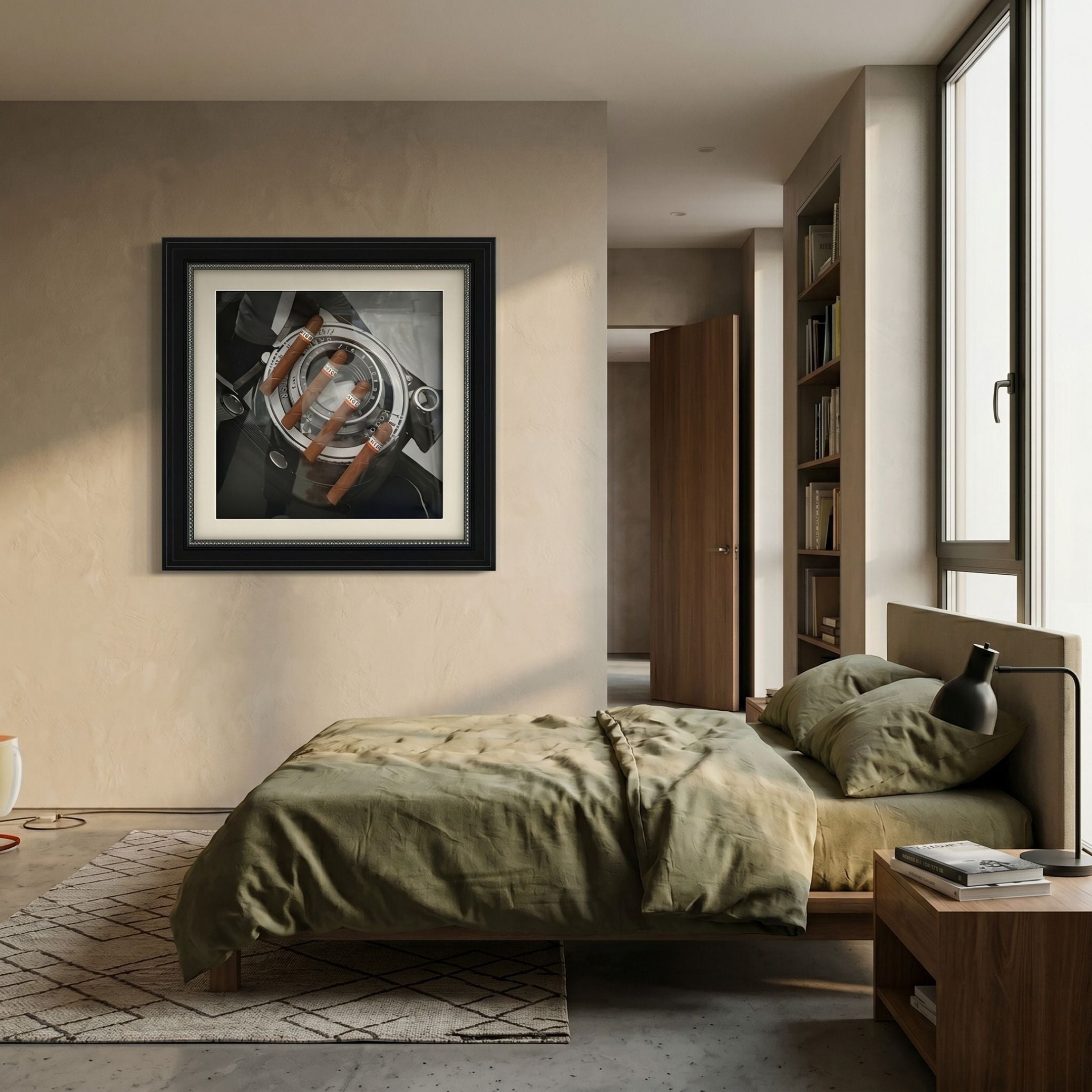 Prestivo Cigar & Vintage Camera Framed Display Wall Art mounted above a green-linen bed in a warm neutral bedroom with bookshelves and a wooden nightstand.