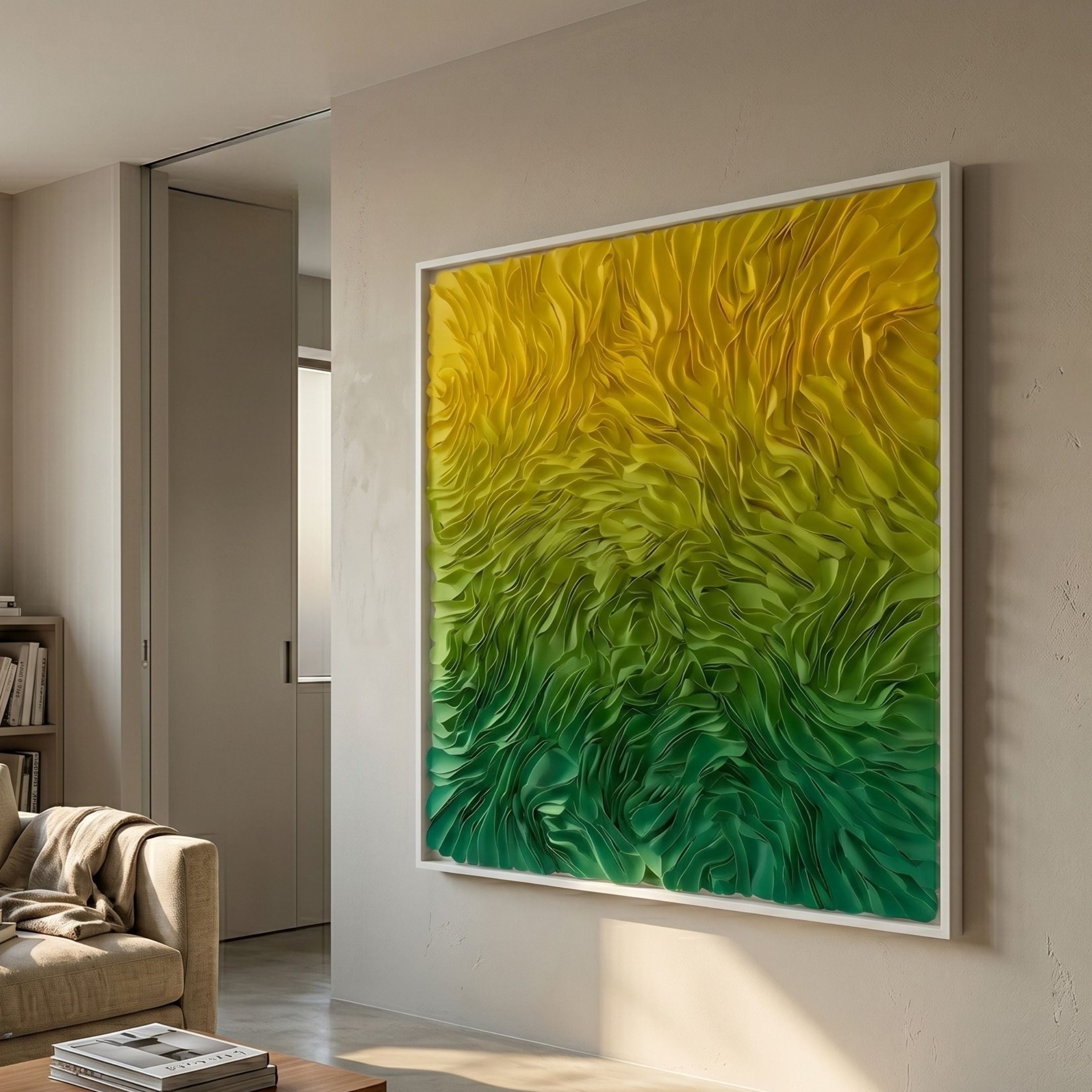 Floravia Yellow & Green Ombre Leaf Leather 3D Wall Art by Giant Sculptures in acrylic box frame, mounted in a modern living room beside a beige sofa.