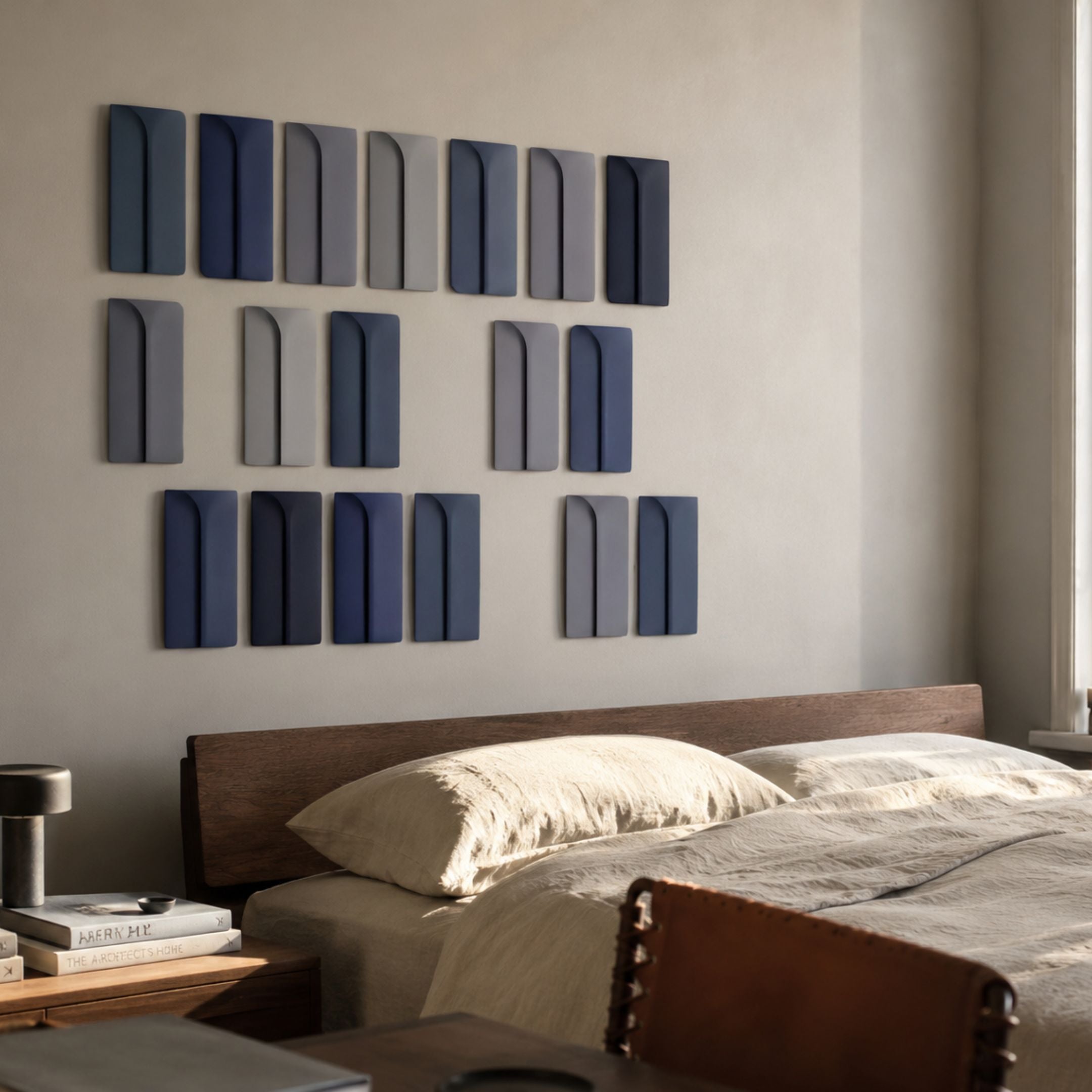 Eximia Blue Tones Multi-Panel Wood Relief 3D Wall Art by Giant Sculptures displayed above a dark wood bed with linen pillows in a Nordic-style bedroom.