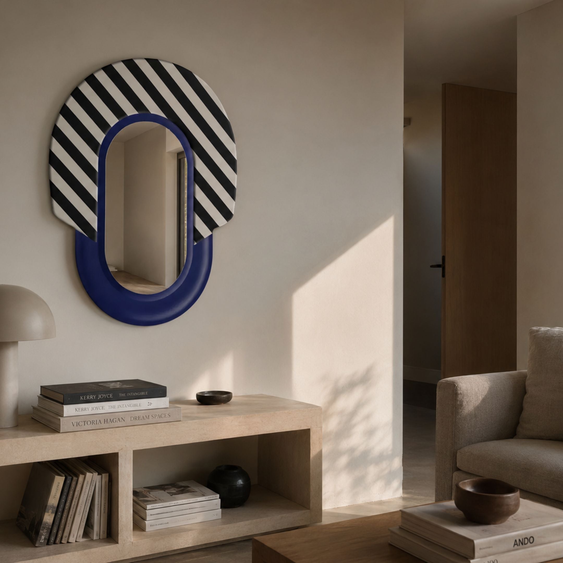 Arcus Purple & Black-White Striped Mirror 3D Wooden Wall Art mounted above a wooden console with books and a lamp in a neutral-toned living room.