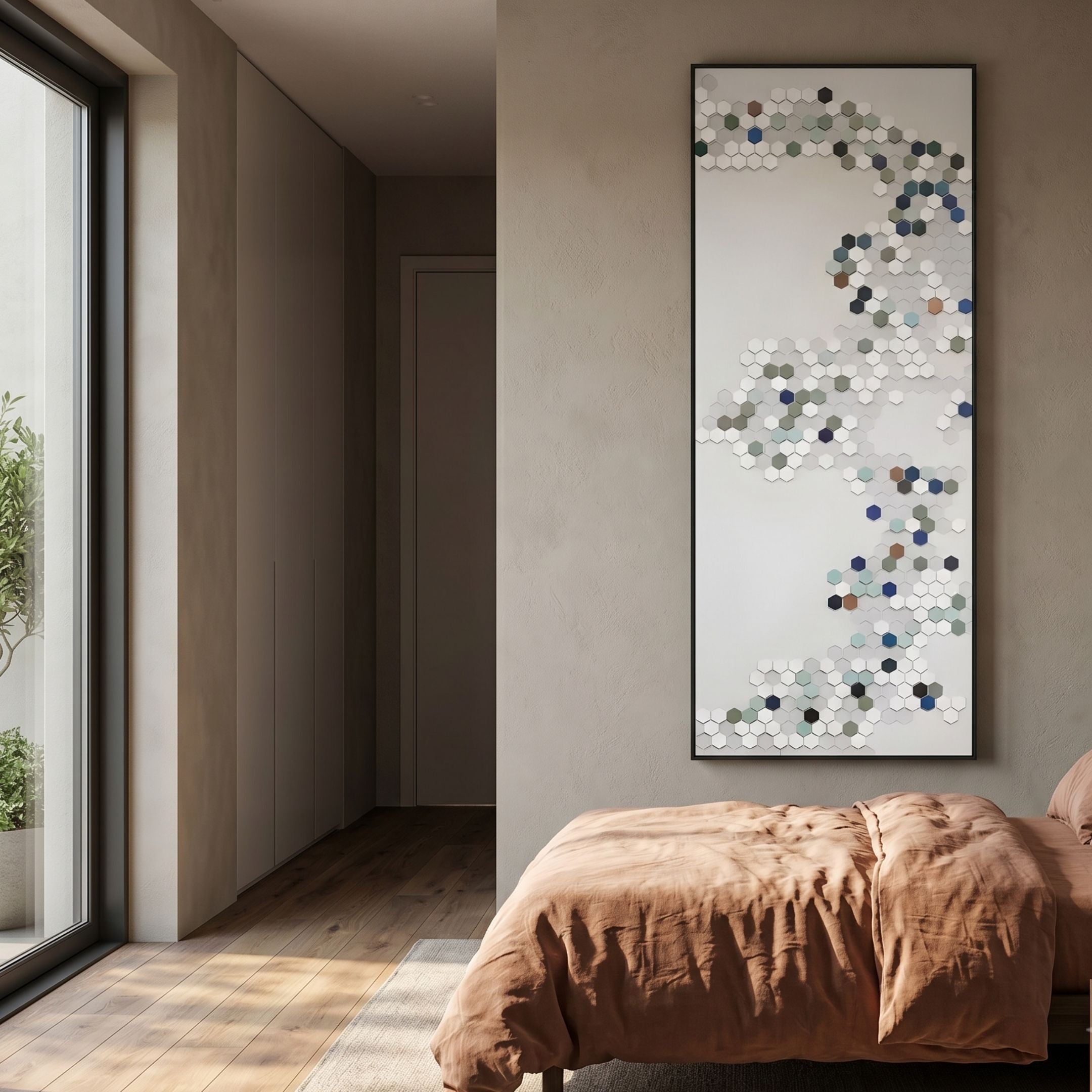 Hexara Vertical I Block Mosaic 3D Wall Art by Giant Sculptures, hung in a modern bedroom above a terracotta-linen bed, showing hexagons in ivory, blue, sage and charcoal.
